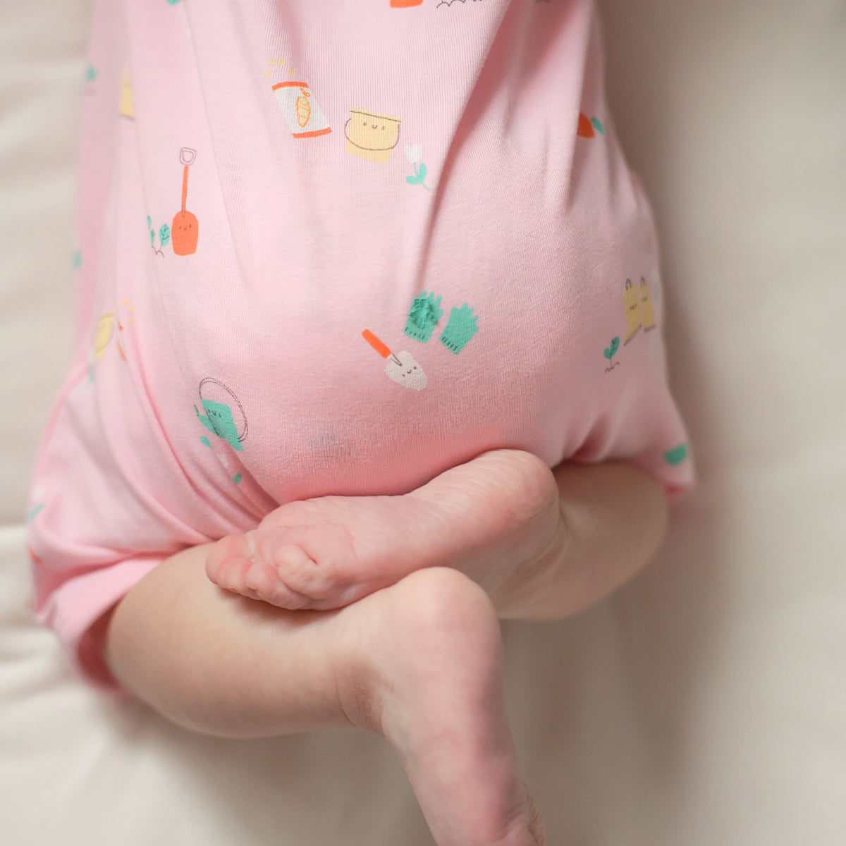 Pink patterned one-piece pajamas, newborn