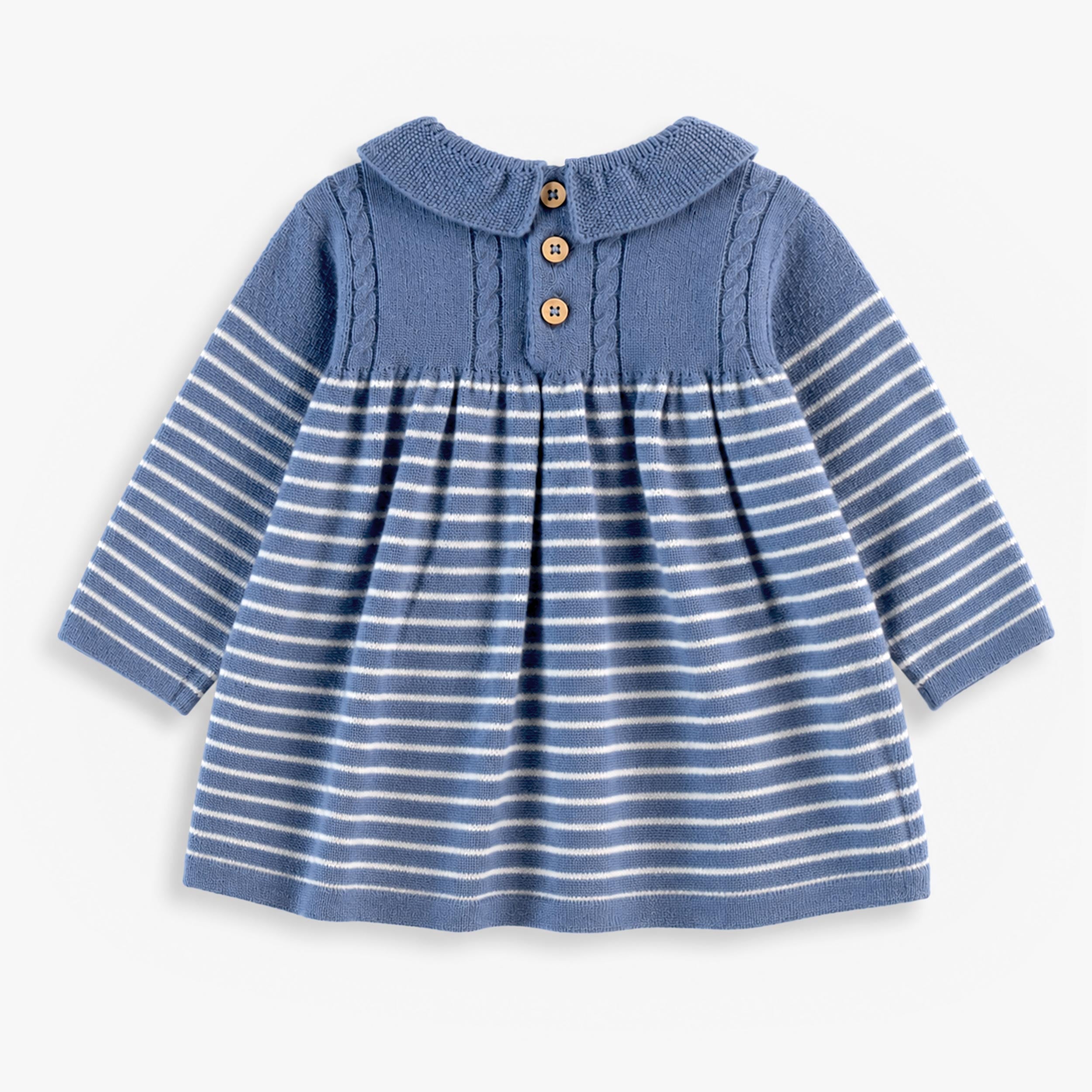 Robe de maille bleu à rayures, naissance