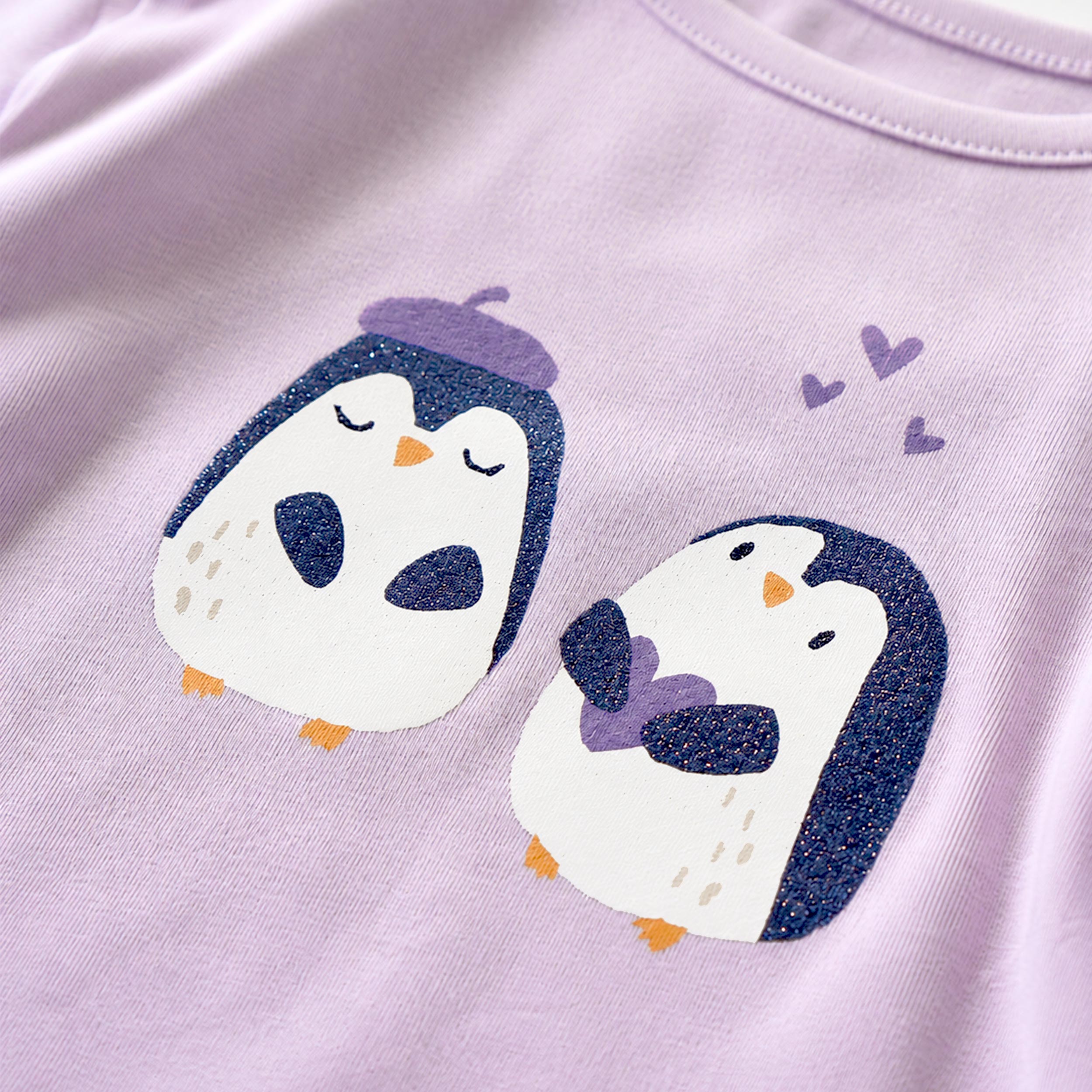 T-shirt mauve avec illustration de pingouins, bébé