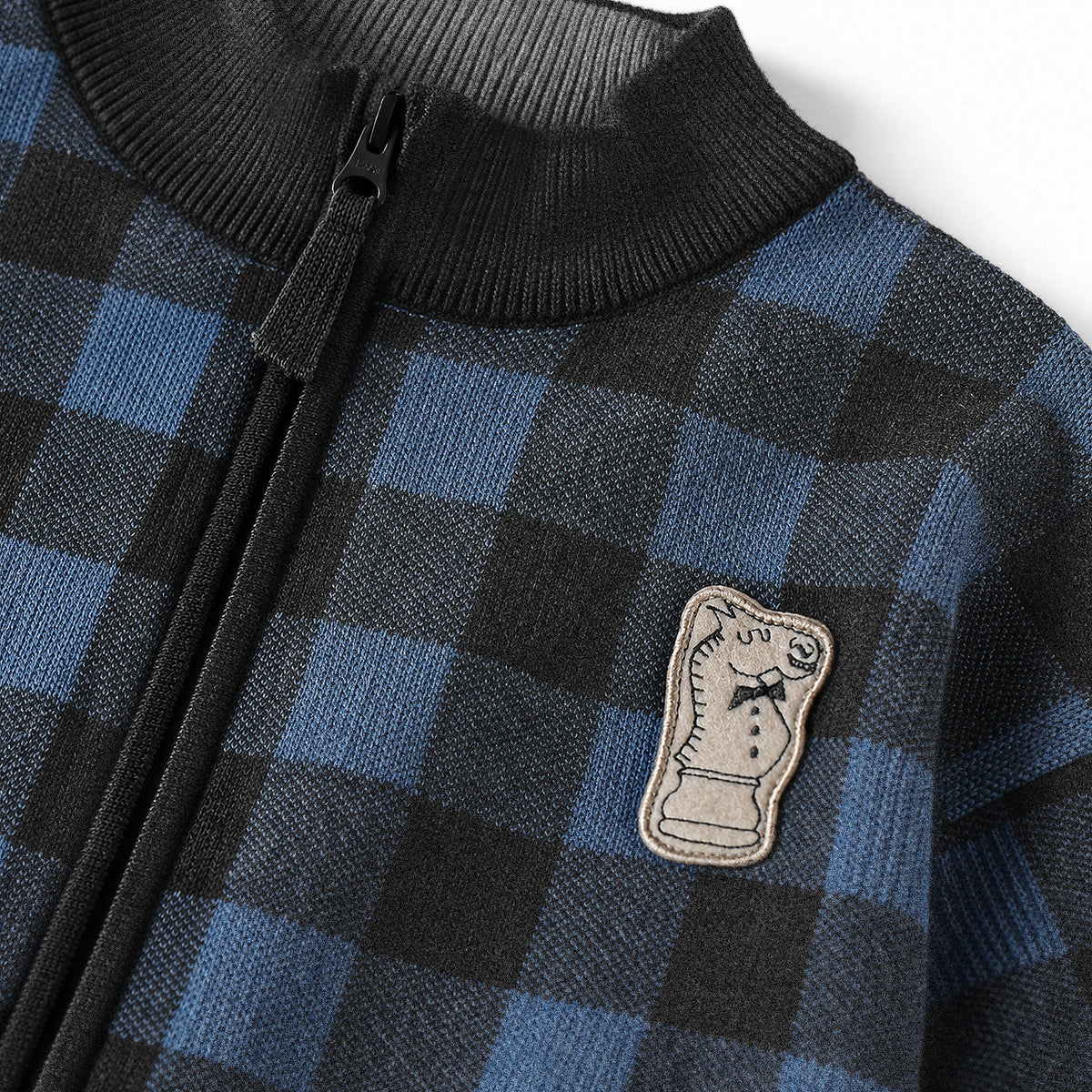Veste de maille à carreaux bleus et noirs, enfant