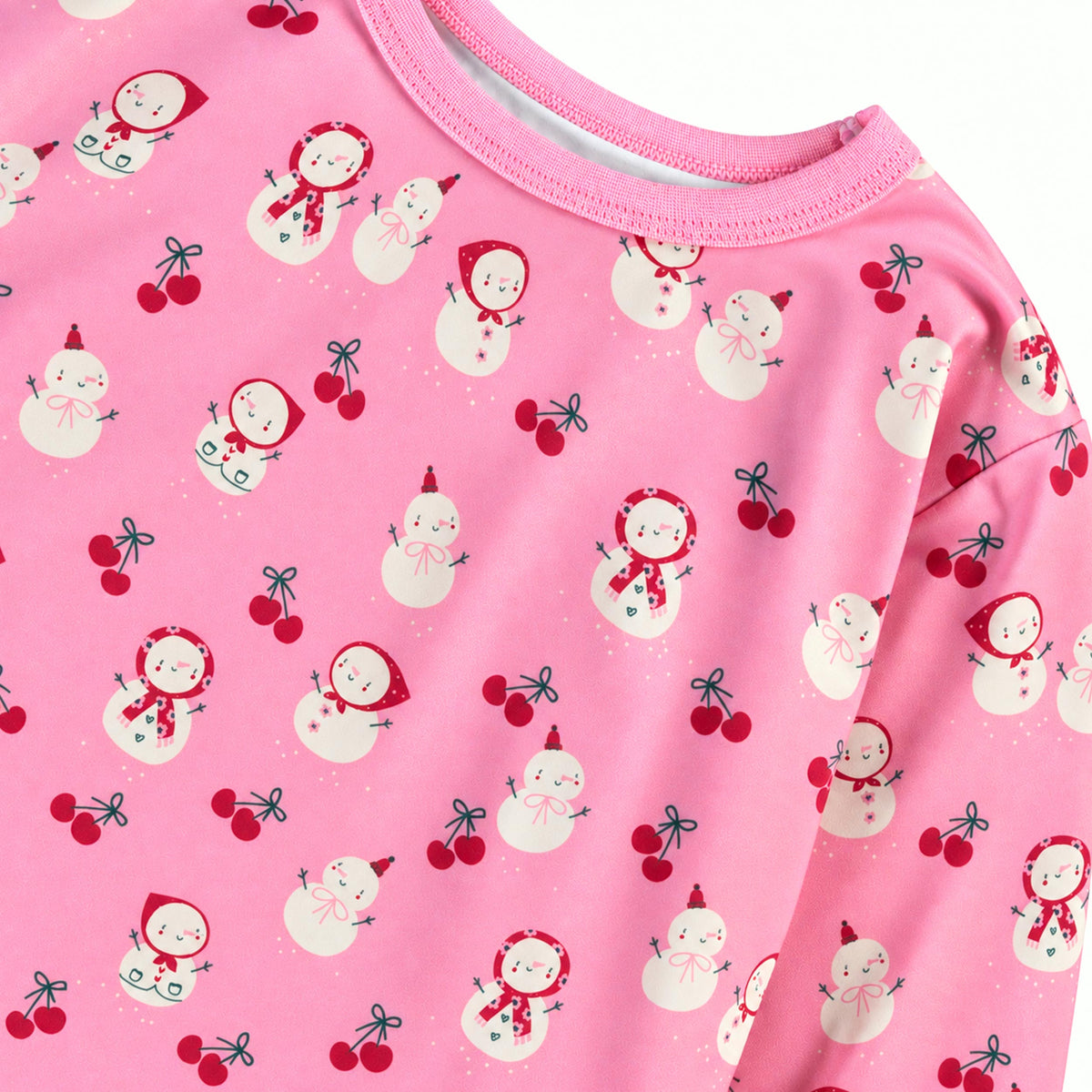 Pyjama deux pièces rose à motifs de bonhommes de neige, enfant