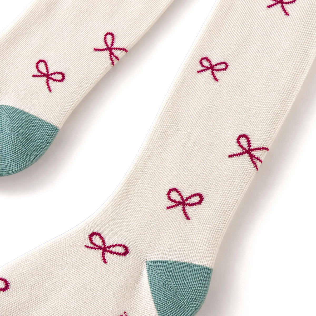 Cream tights with small bow print, child