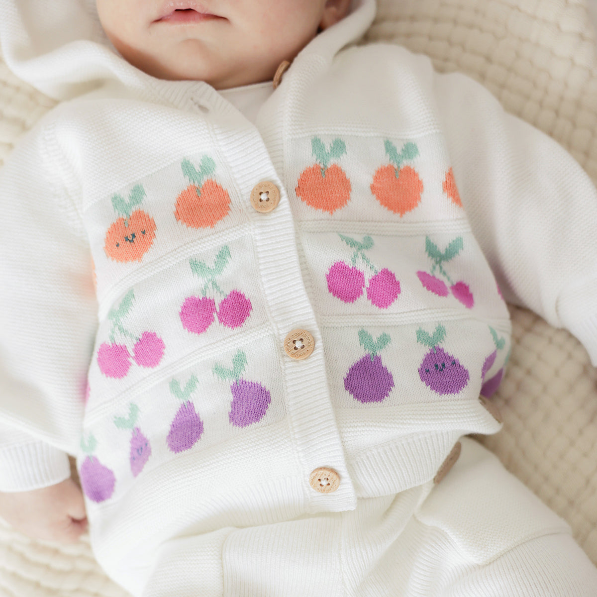 Cardigan crème en tricot avec motifs jacquard, naissance