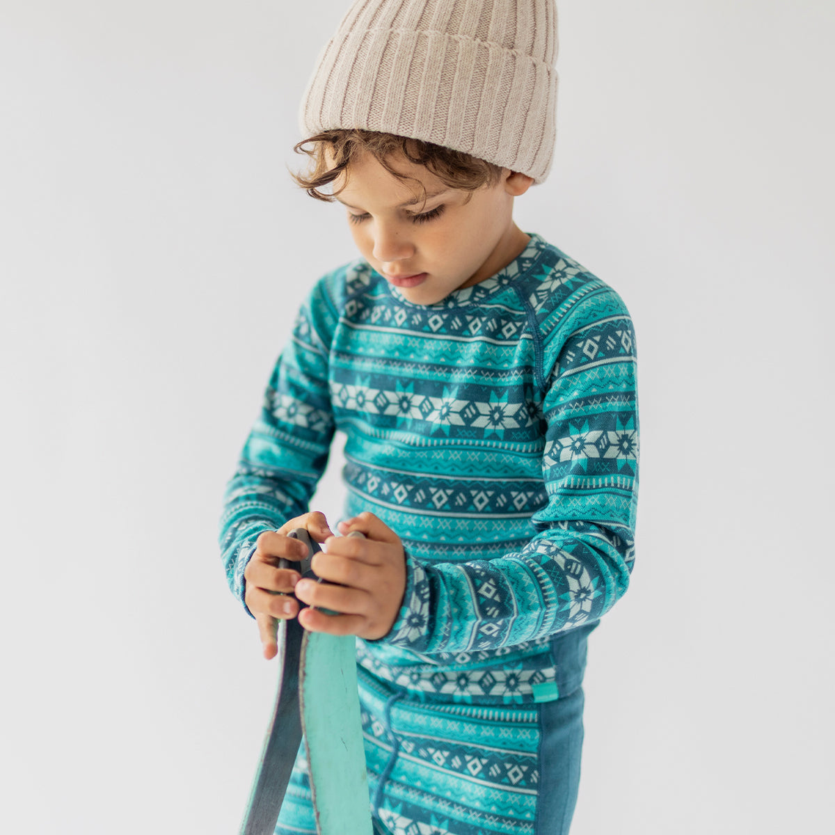 Legging turquoise en laine mérinos avec motifs jacquard, enfant