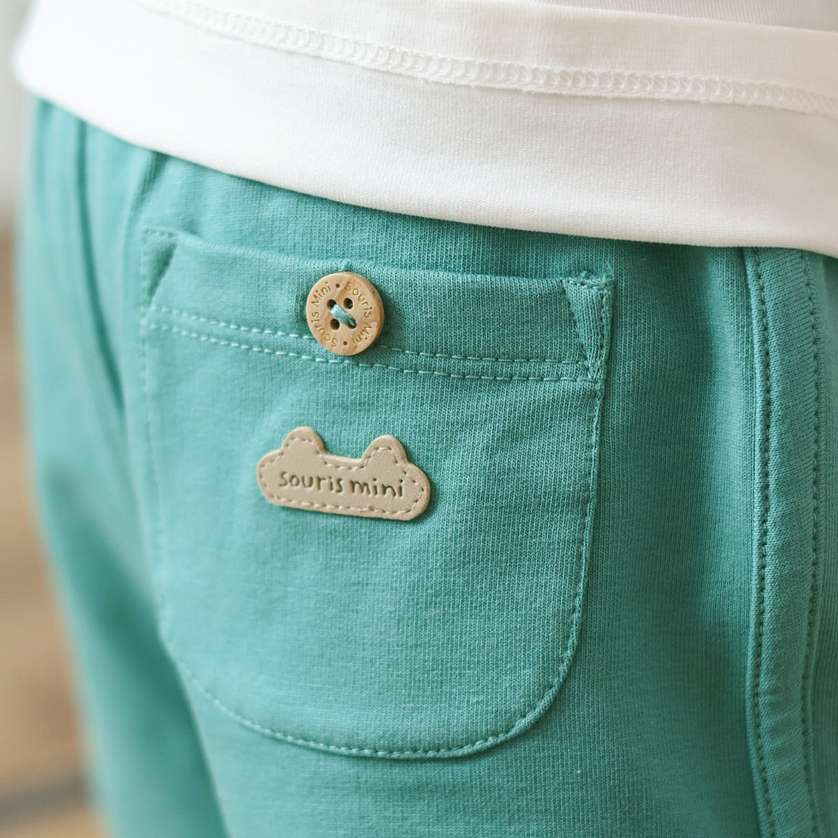 Short vert en coton français, naissance