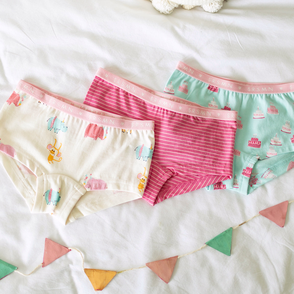 Présentation de la culotte garçonne turquoise à motifs de gâteaux, enfant