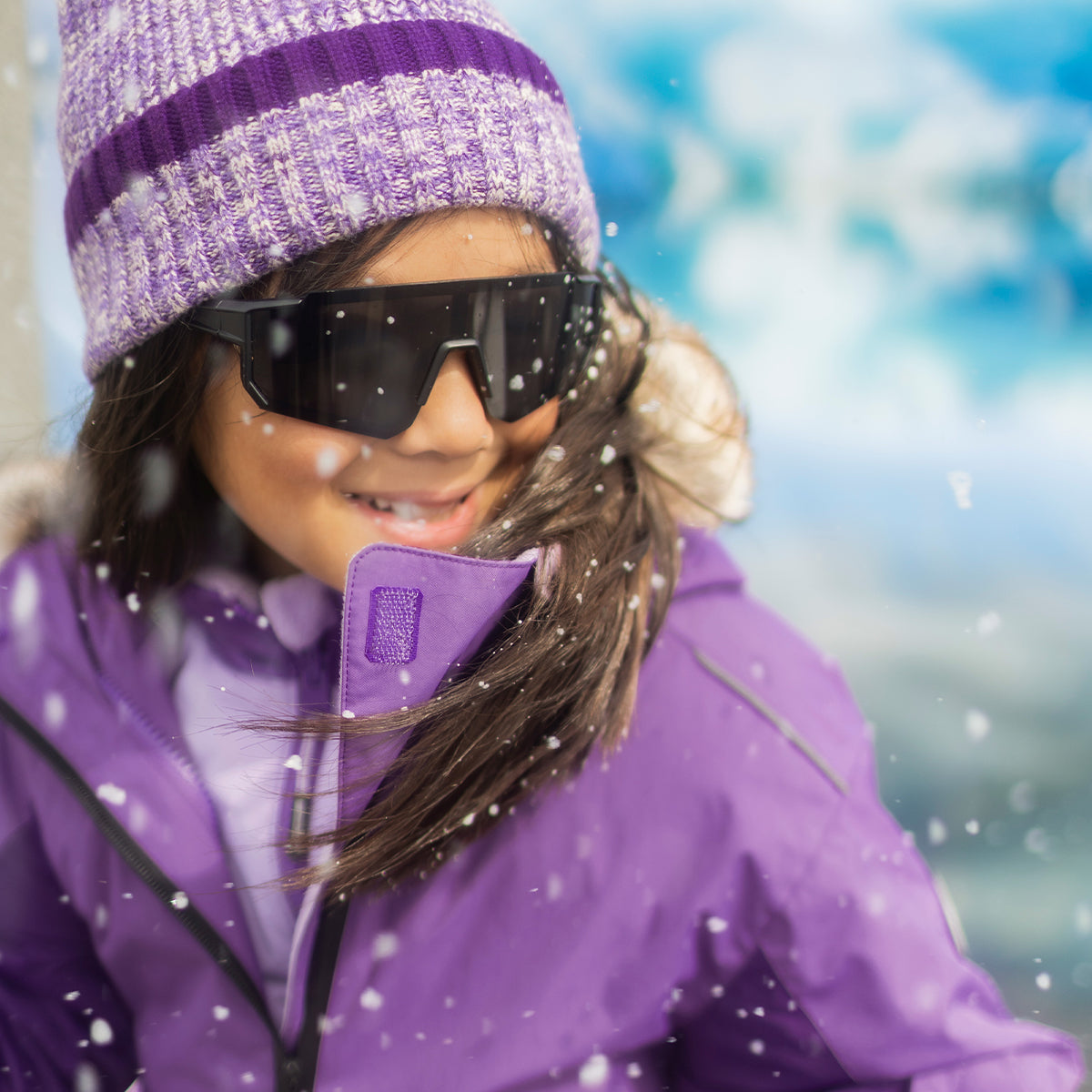 Photo d'un enfant portant le manteau d’hiver 3 en 1 mauve, enfant