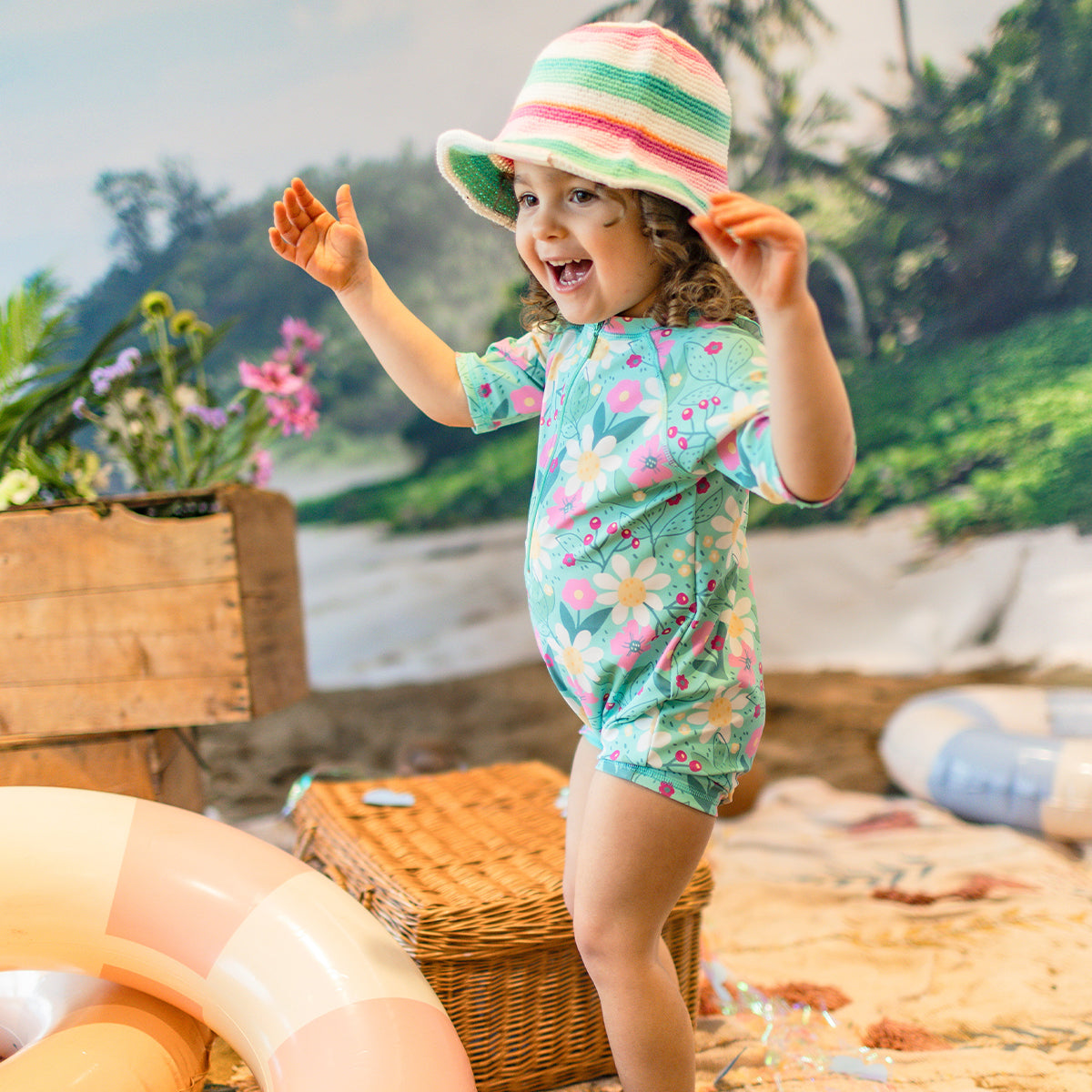 Turquoise one-piece swimsuit with floral all over print, baby