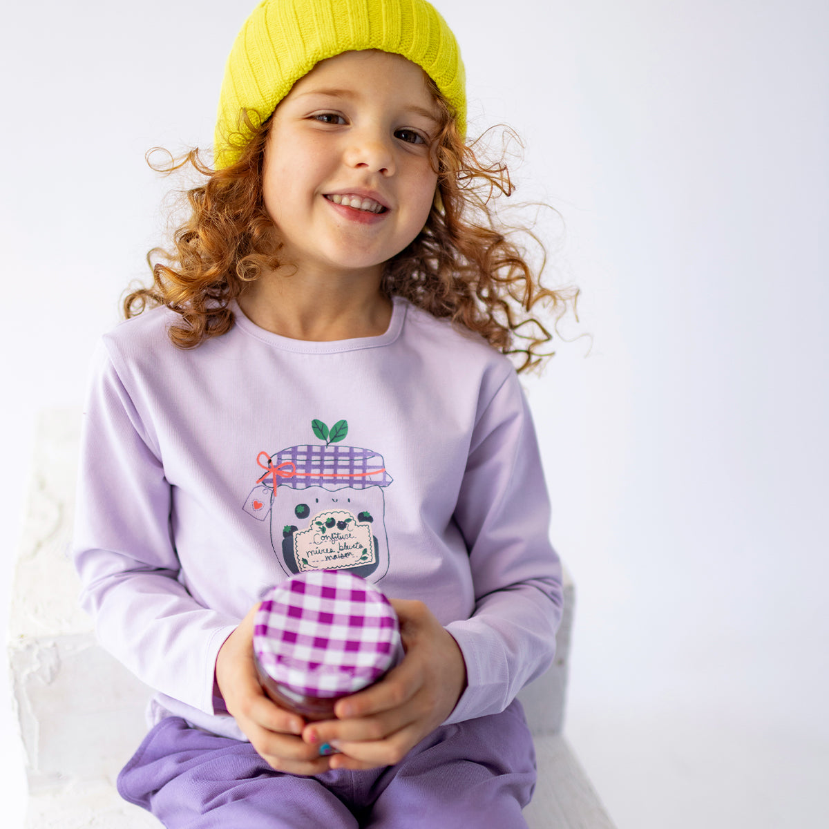 Purple t-shirt with illustration, child
