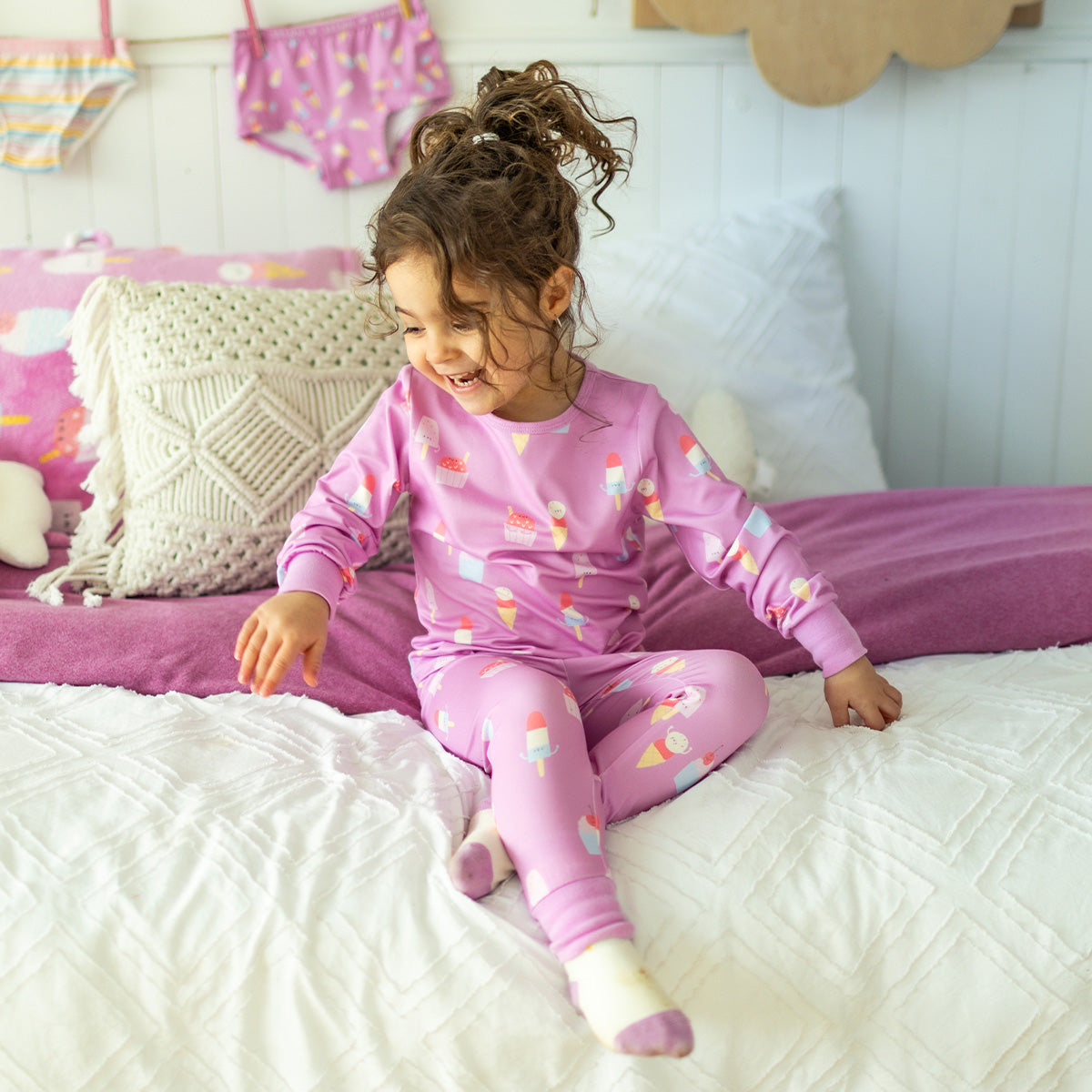 Purple two-piece pajamas with frozen treat all over print, baby
