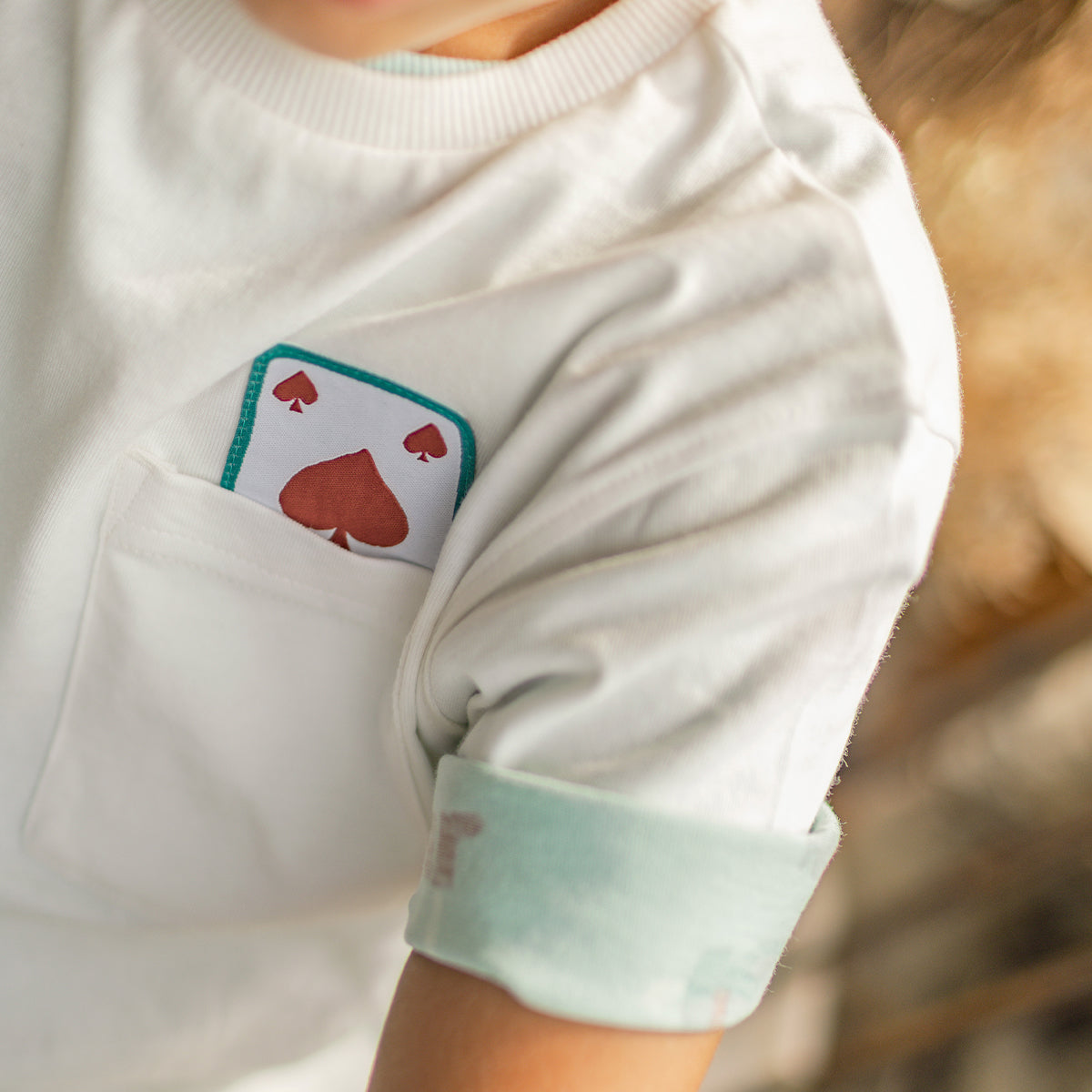 T-shirt crème avec illustration au dos, enfant