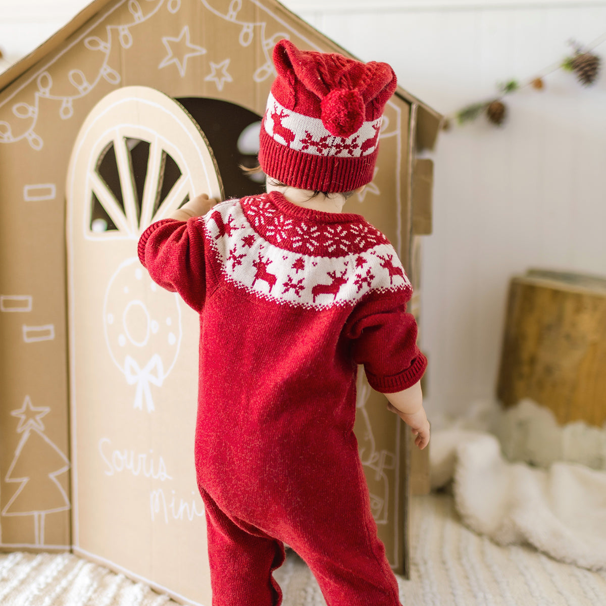 Red knit one-piece with jacquard patterns, newborn