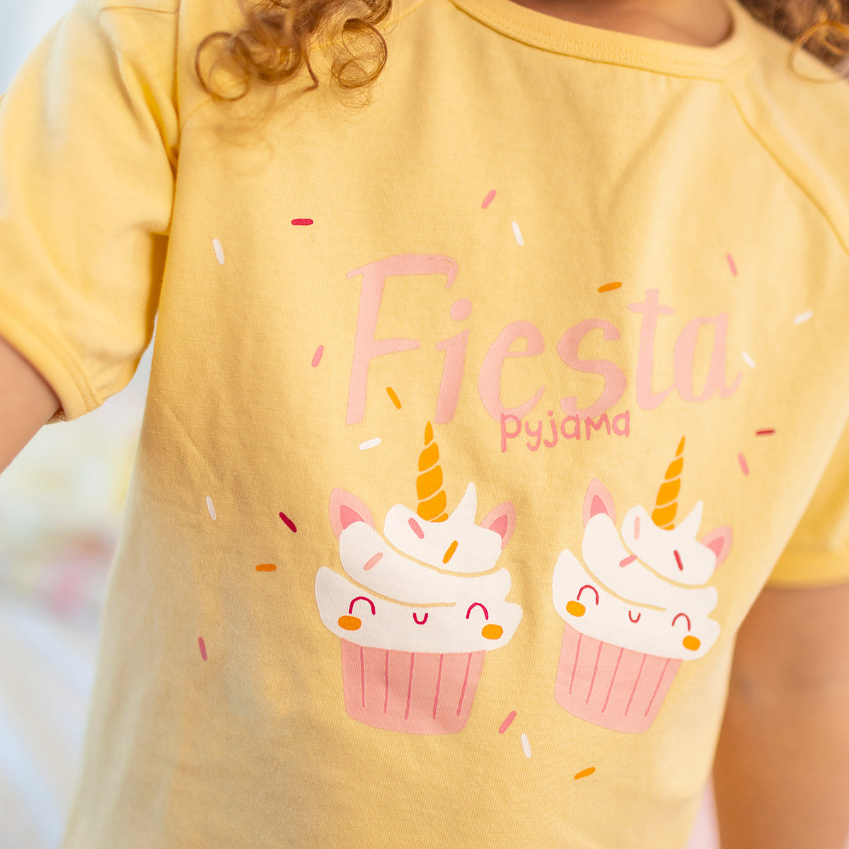 Yellow two-piece pajamas with cake pattern, child