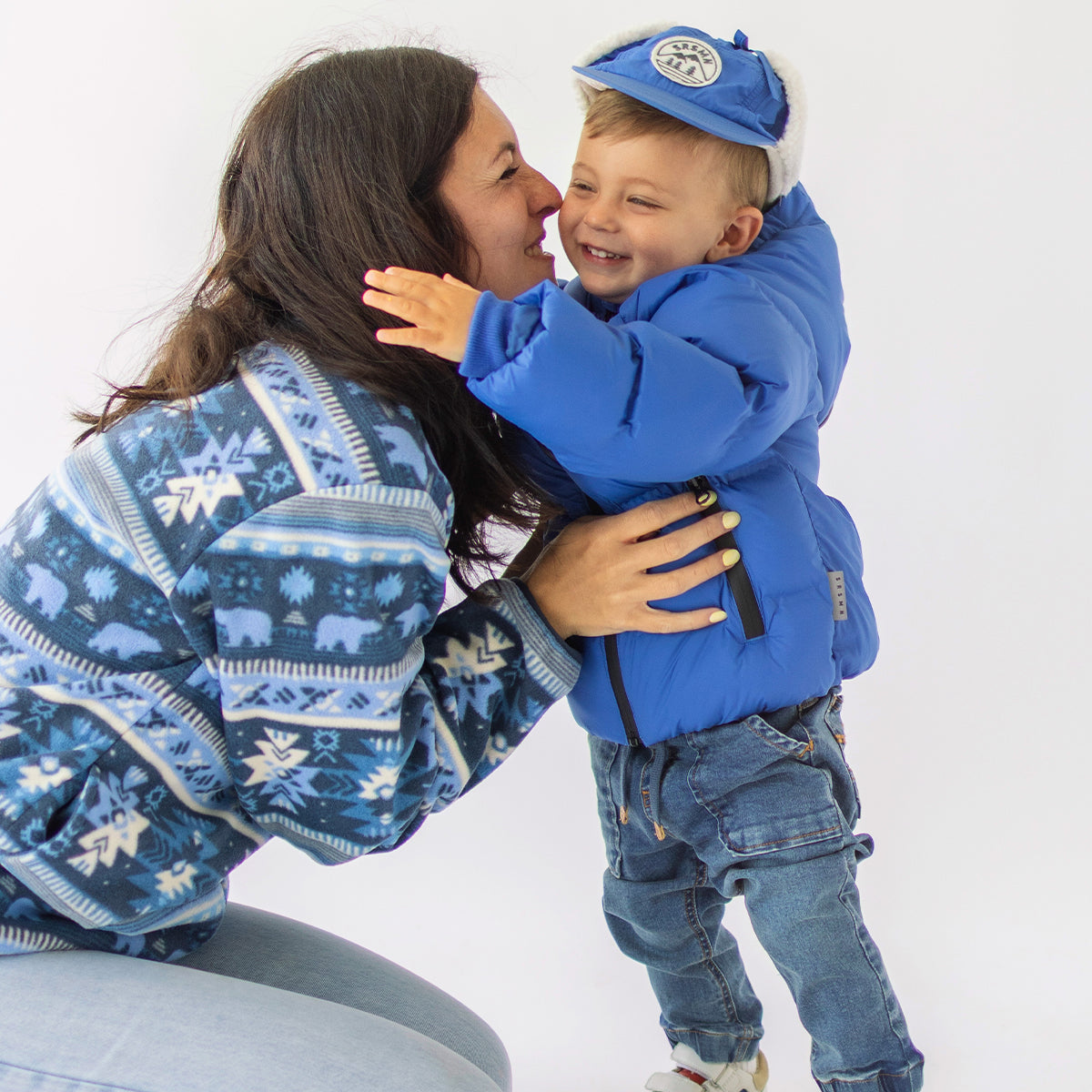 Photo d'un enfant portant le manteau doudoune bleu, bébé