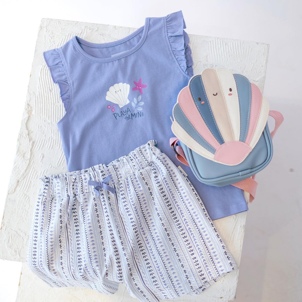 Short blanc et bleu à motifs, enfant