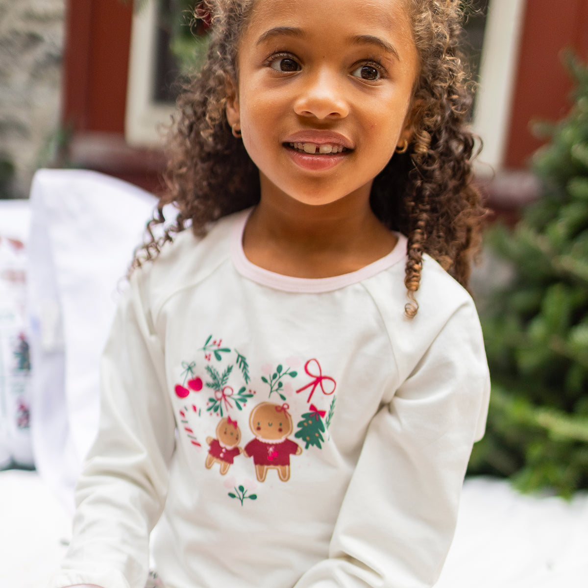 Cream two-piece holiday print pajamas, child
