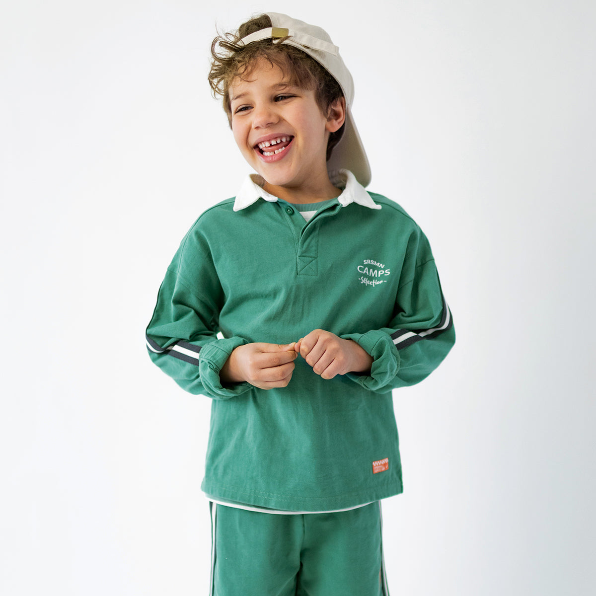 Green polo shirt, child