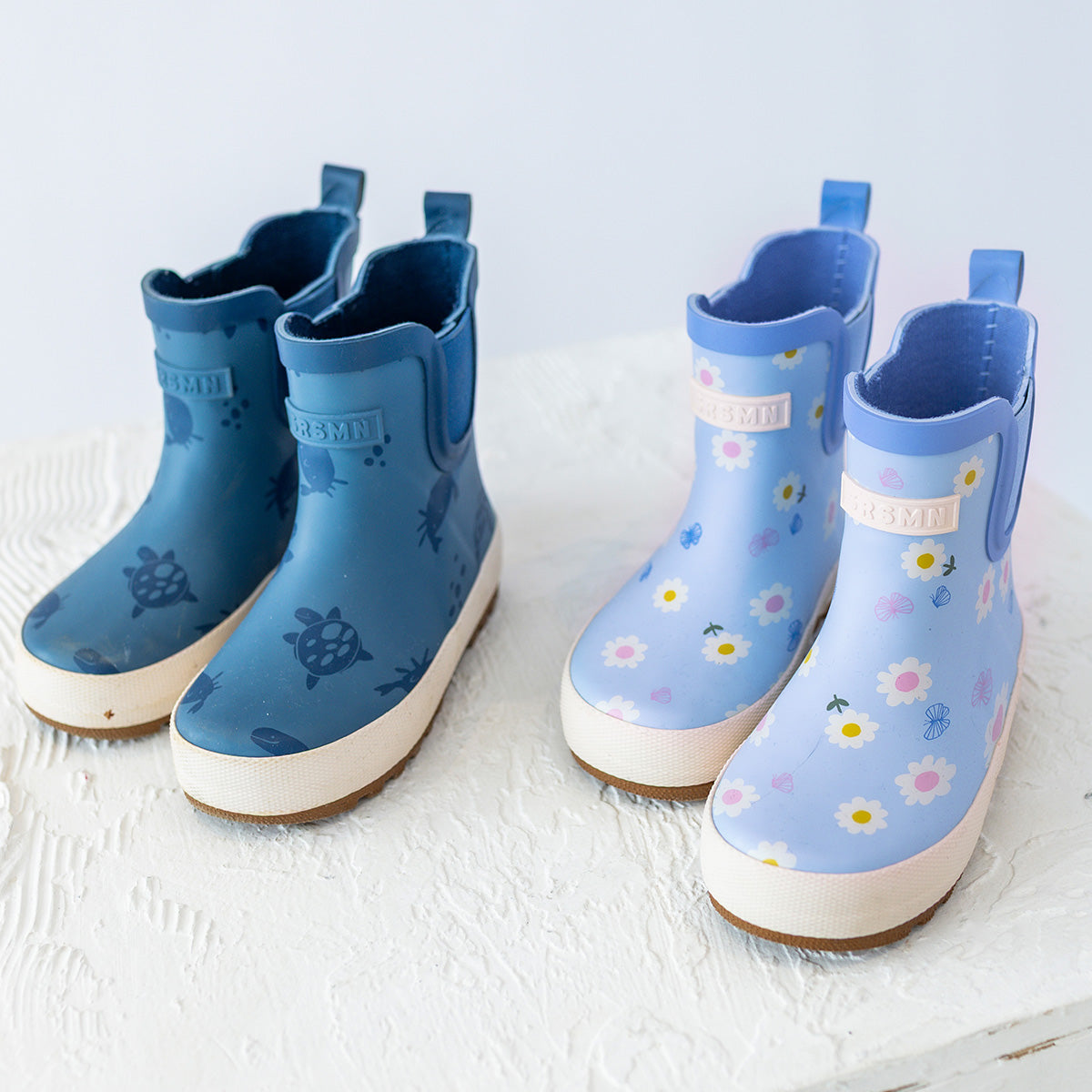 Light blue short rain boots with flowers and butterflies, child