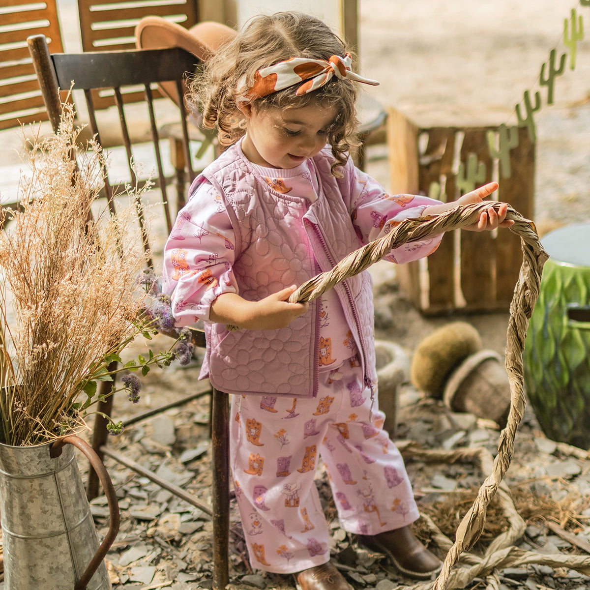 Pantalon rose à motifs bottes de cowboy, bébé