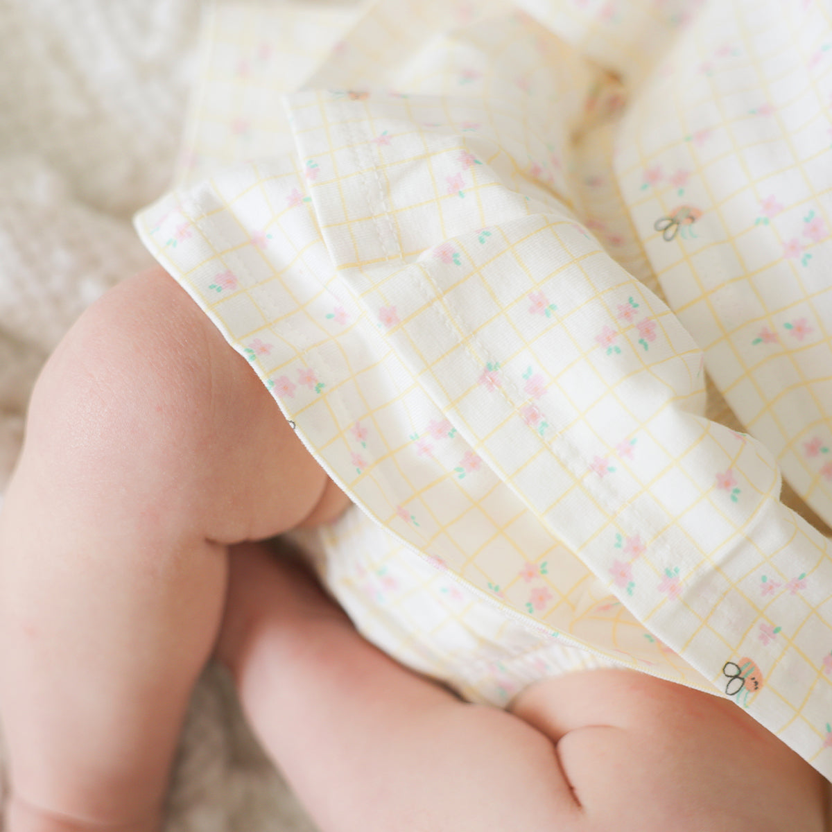 Two-piece cream set with checkered and floral pattern, newborn