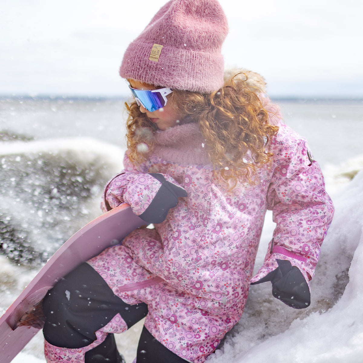Pink floral print one-piece snowsuit , child