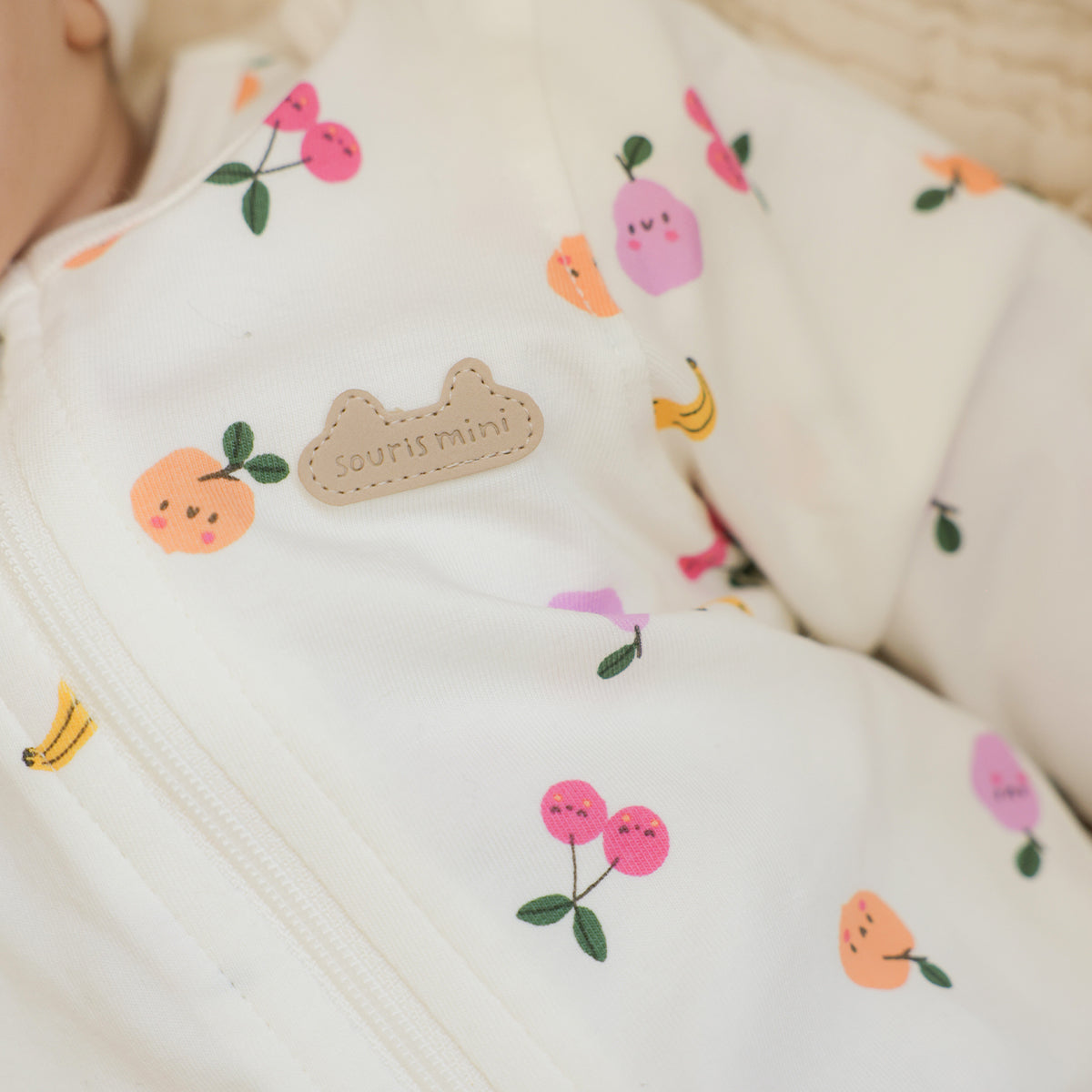 Cream one-piece pajama with fruit all over print, newborn