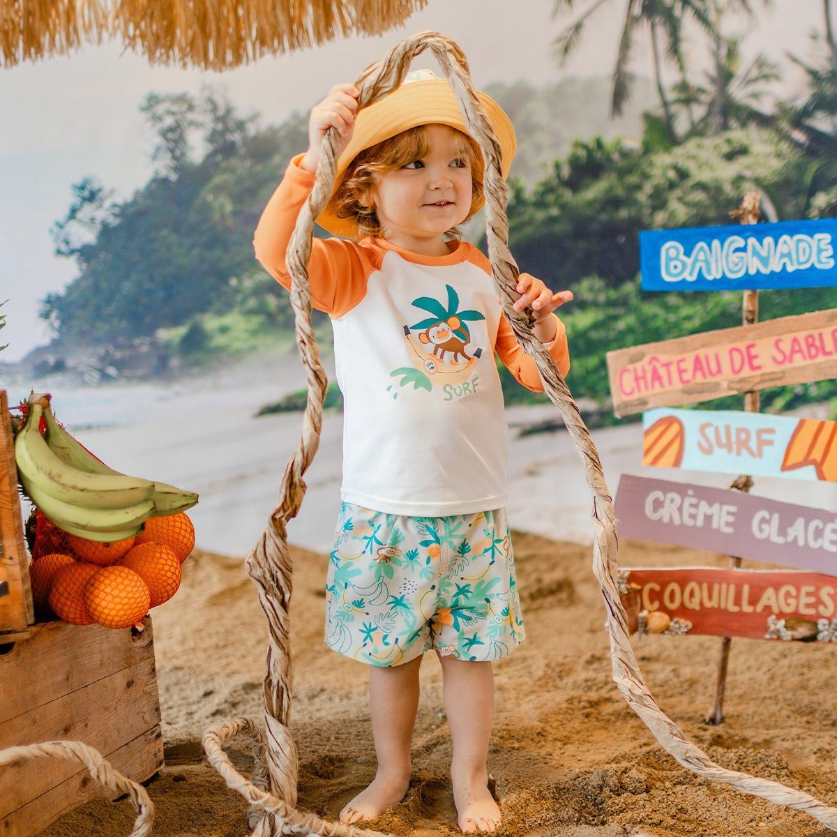 Bermuda de bain beige à motifs tropicaux, bébé