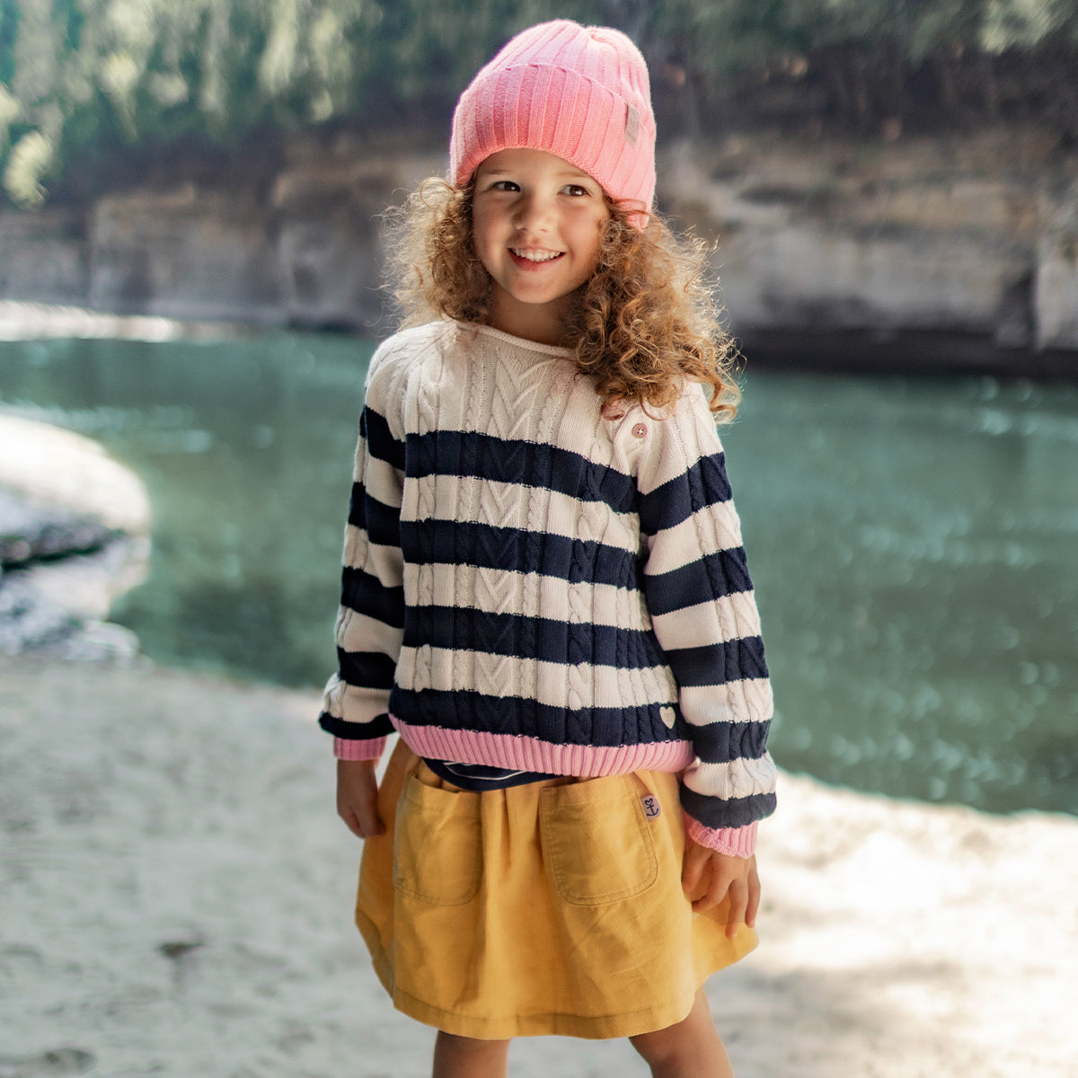 Cream and dark blue striped knit sweater, child