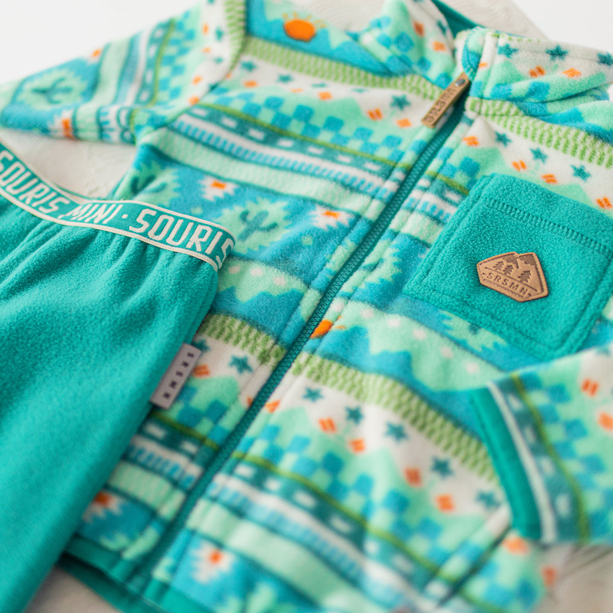 Veste en polar turquoise à motifs, enfant
