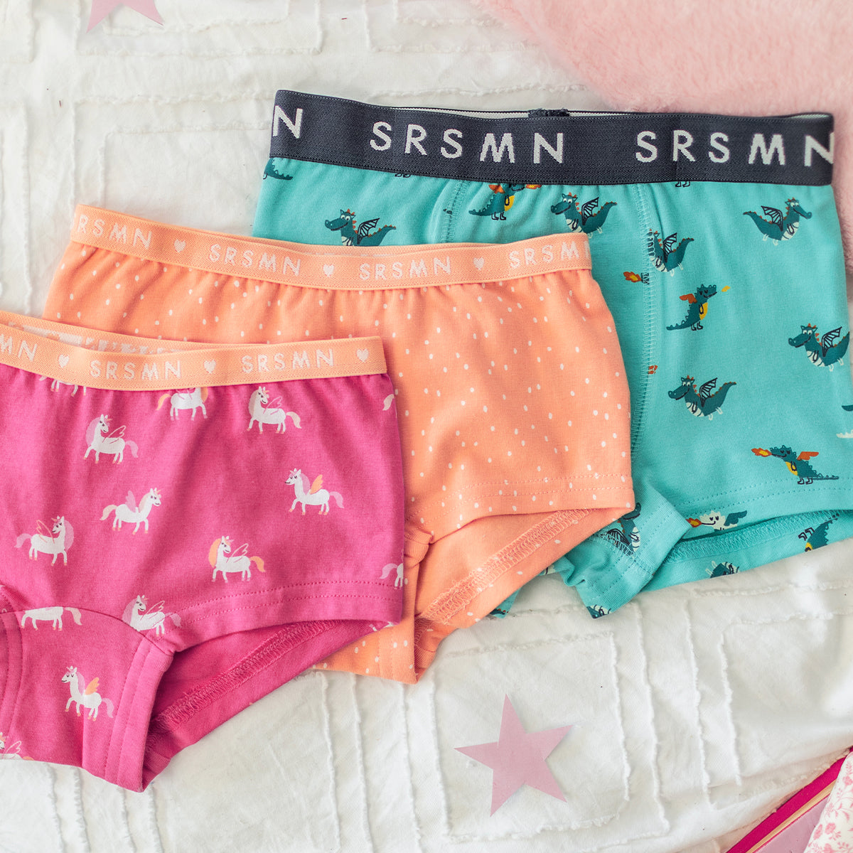 Dark pink boy-style panties with unicorn pattern, child