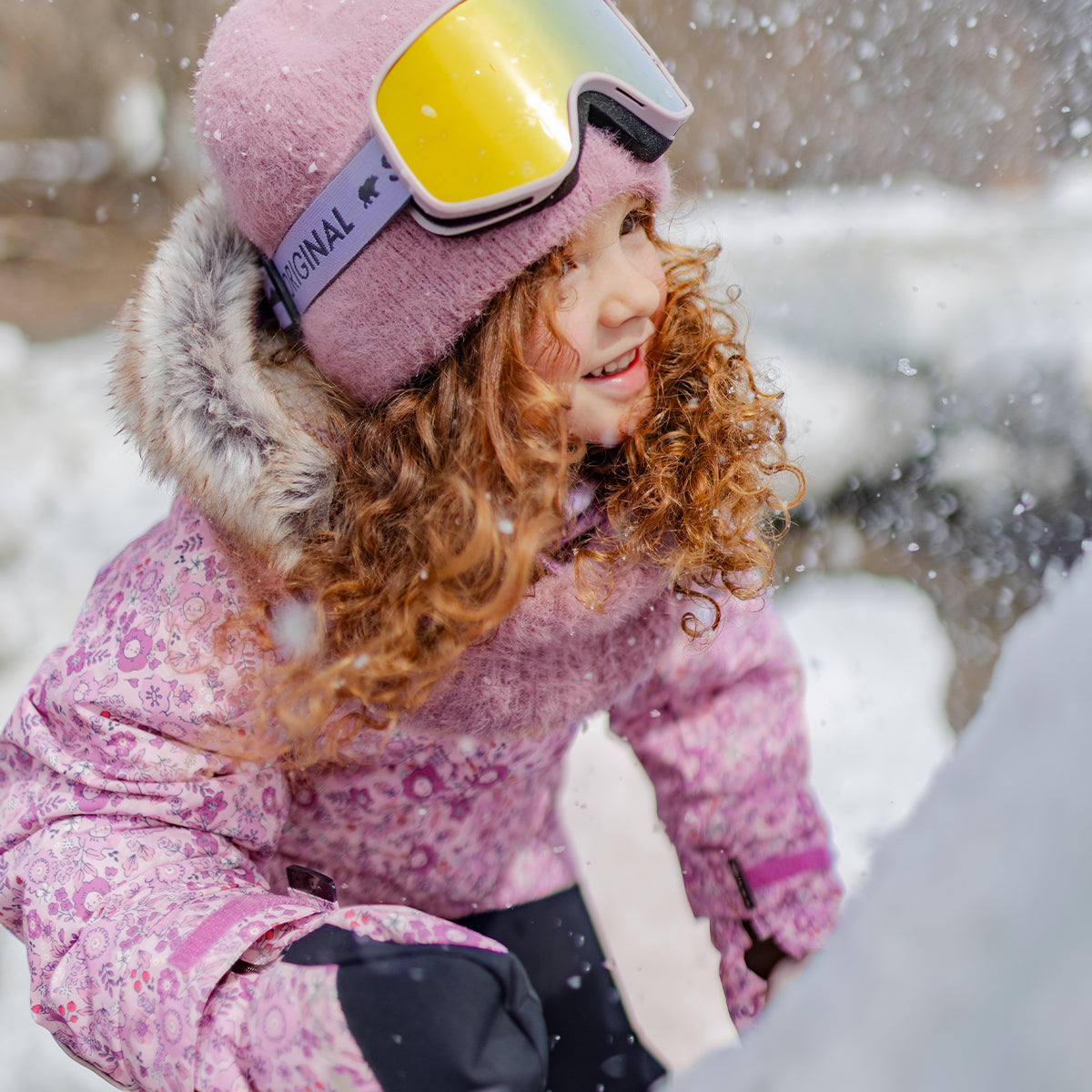 Pink floral print one-piece snowsuit , child