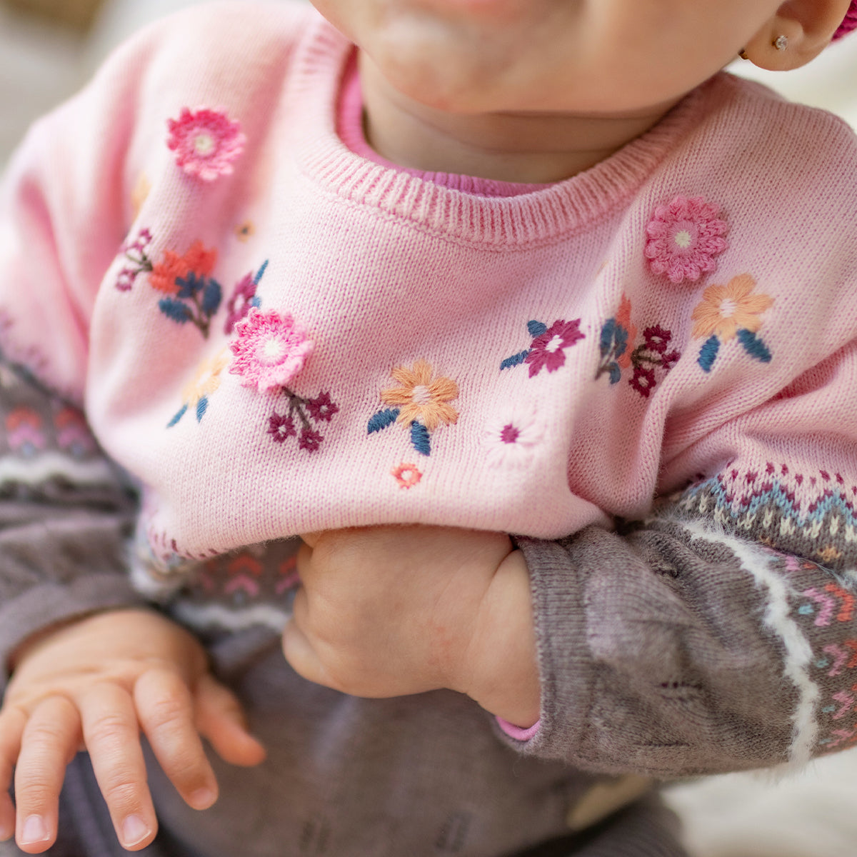 Pink and grey jacquard knit sweater, baby