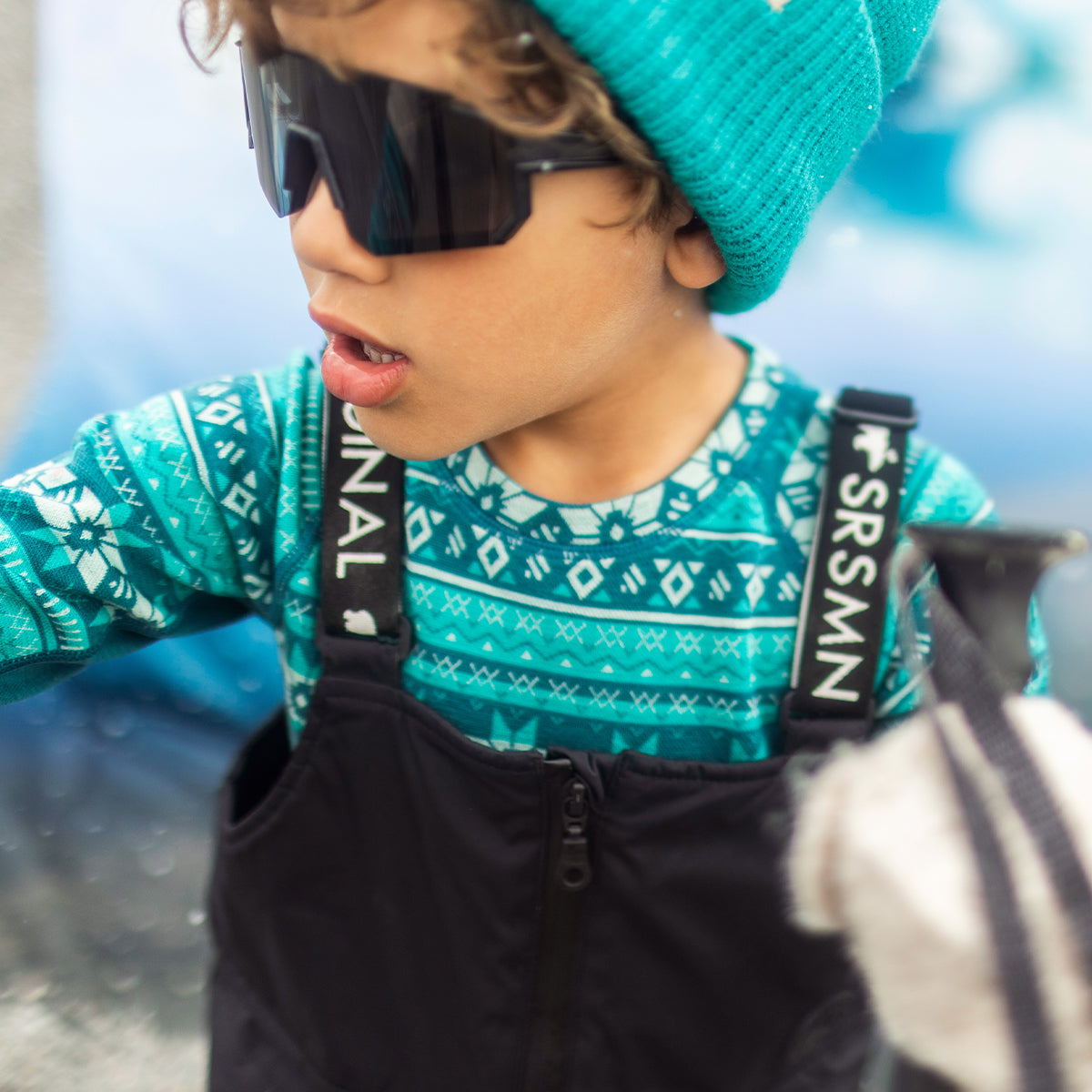 Chandail turquoise en laine mérinos avec motifs jacquard, enfant