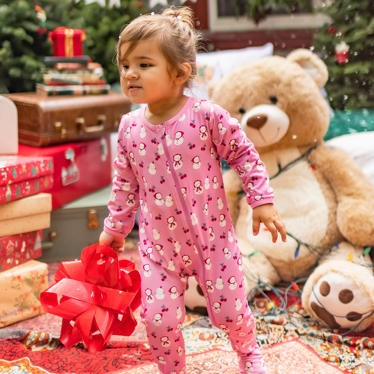 Pyjama une pièce rose à motifs de bonhommes de neige, bébé