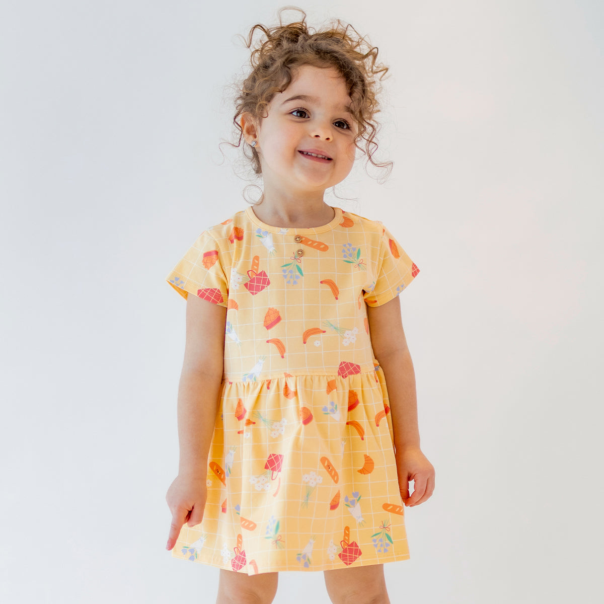 Yellow patterned dress, baby