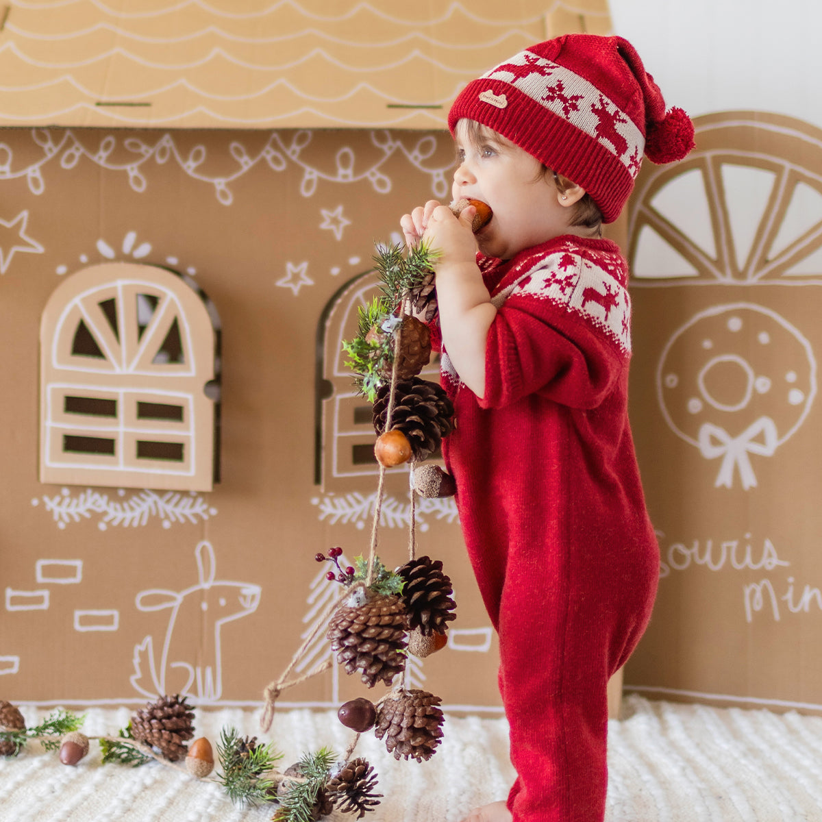 Red knit one-piece with jacquard patterns, newborn