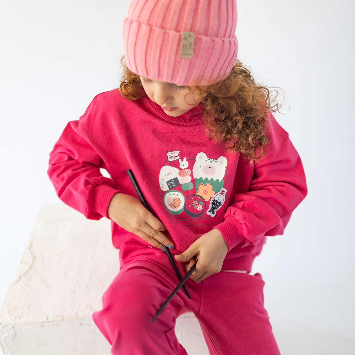 Dark pink sweatshirt with illustration, child