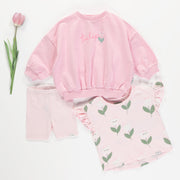 T-shirt ample rose à motifs de jolies tulipes en jersey extensible, bébé || Loose-fitting pink t-shirt with tulip all over print in stretch jersey, baby