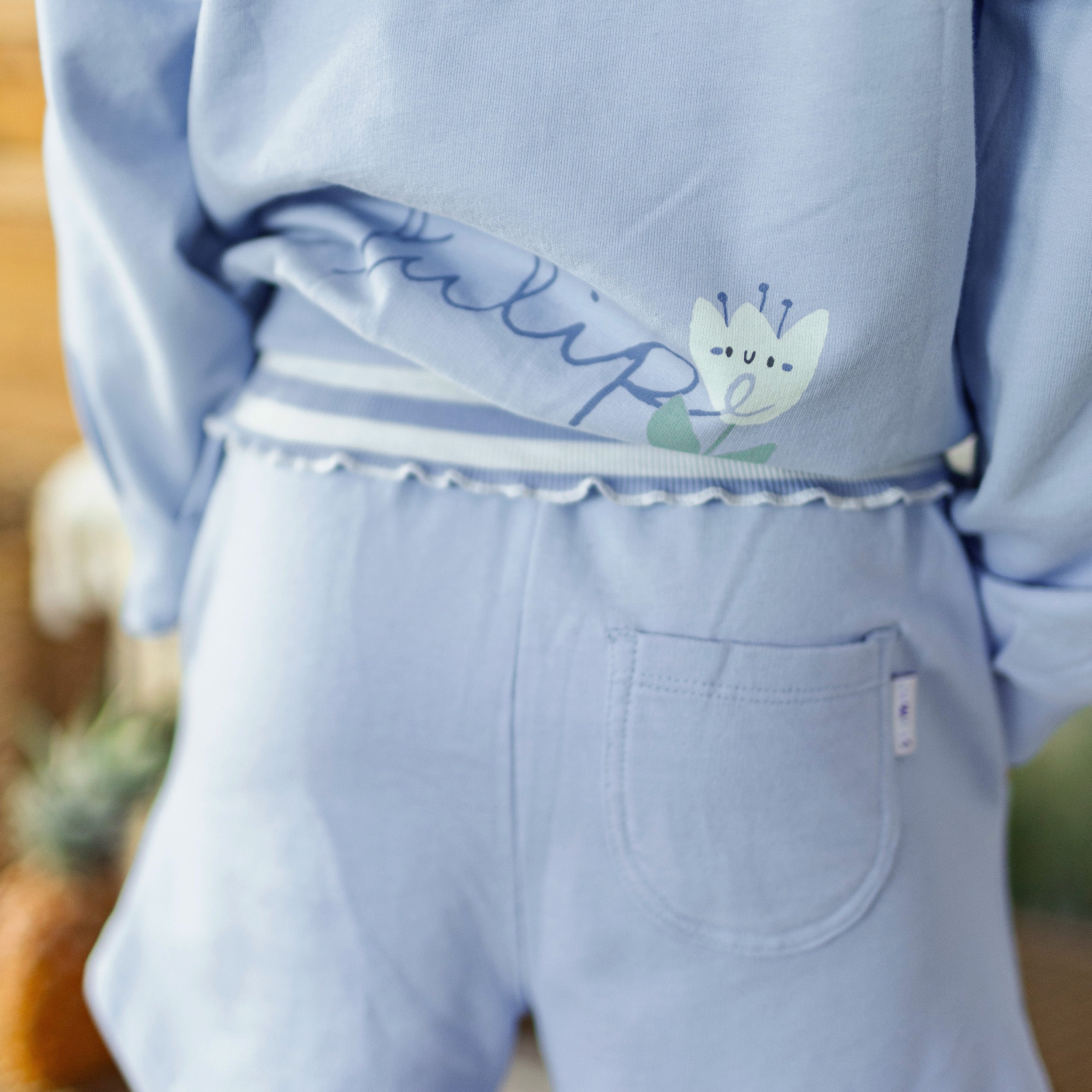 Loose-fitting celestial blue sweater with tulip motif in french cotton, child