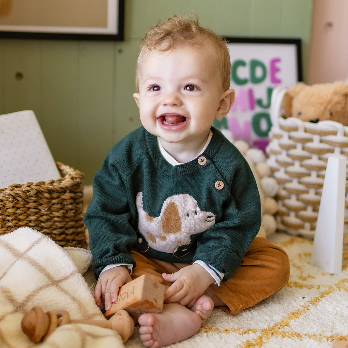 Chandail vert en tricot avec motif jacquard, naissance