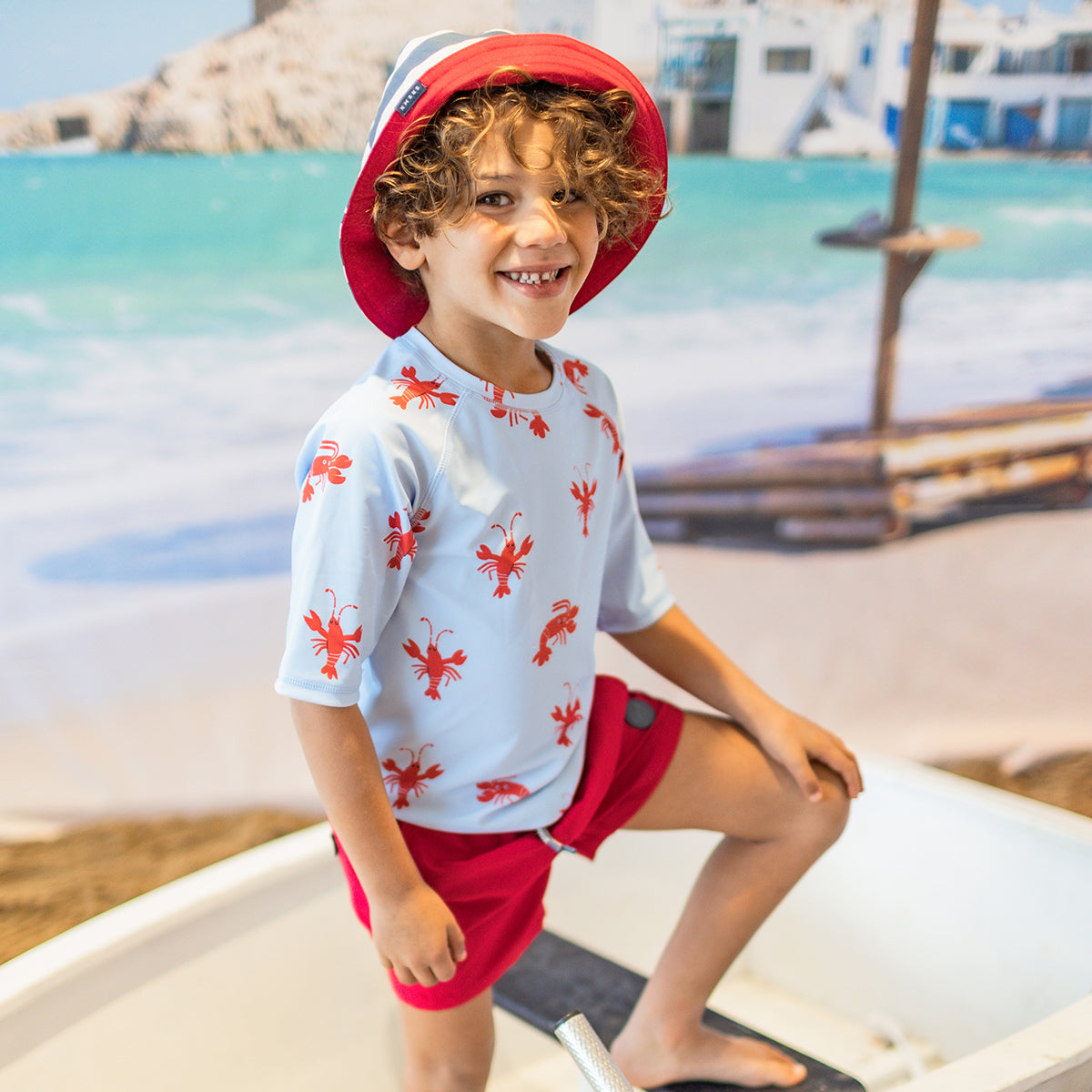 T-shirt de bain bleu pâle à motifs de homards, enfant