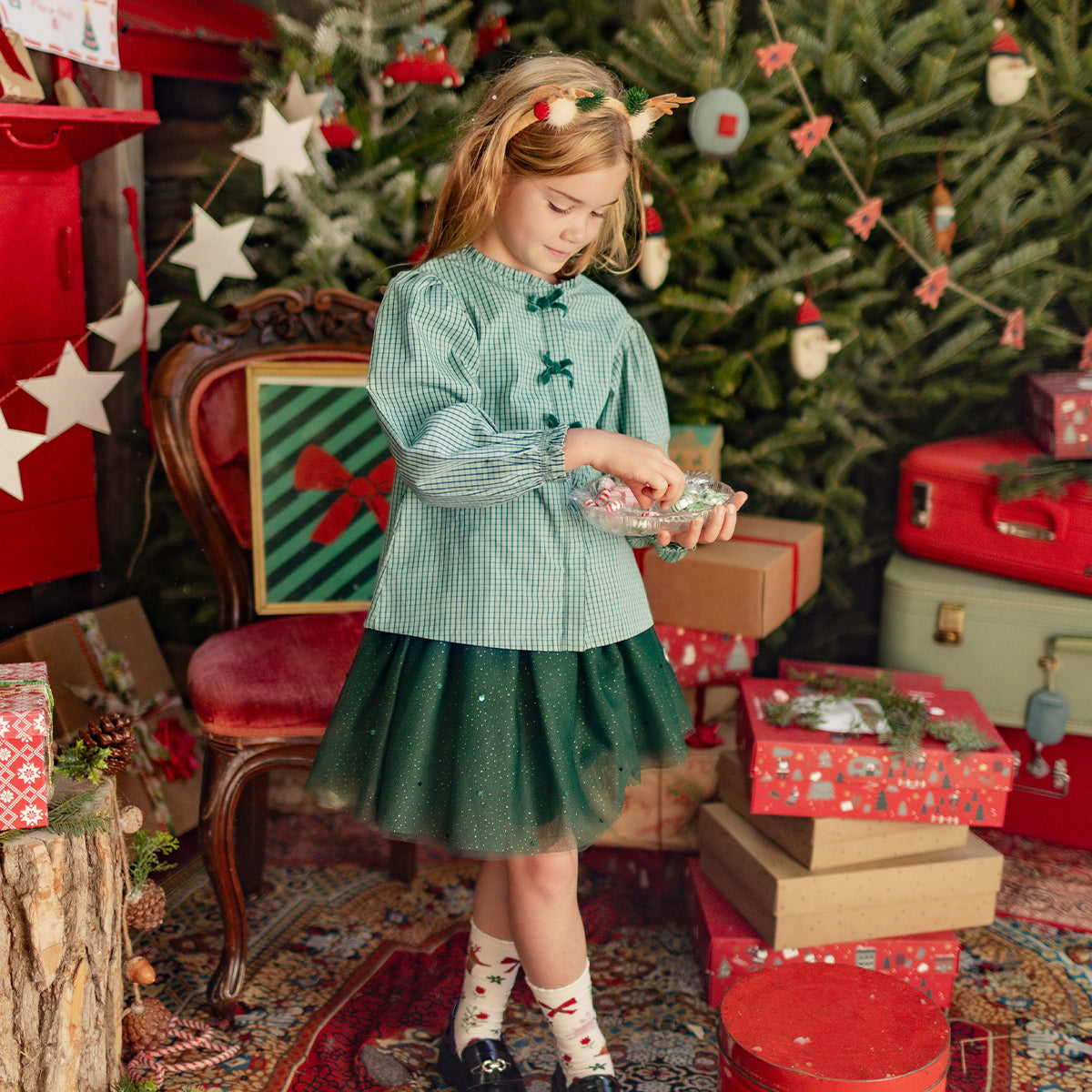 Green gingham blouse, child