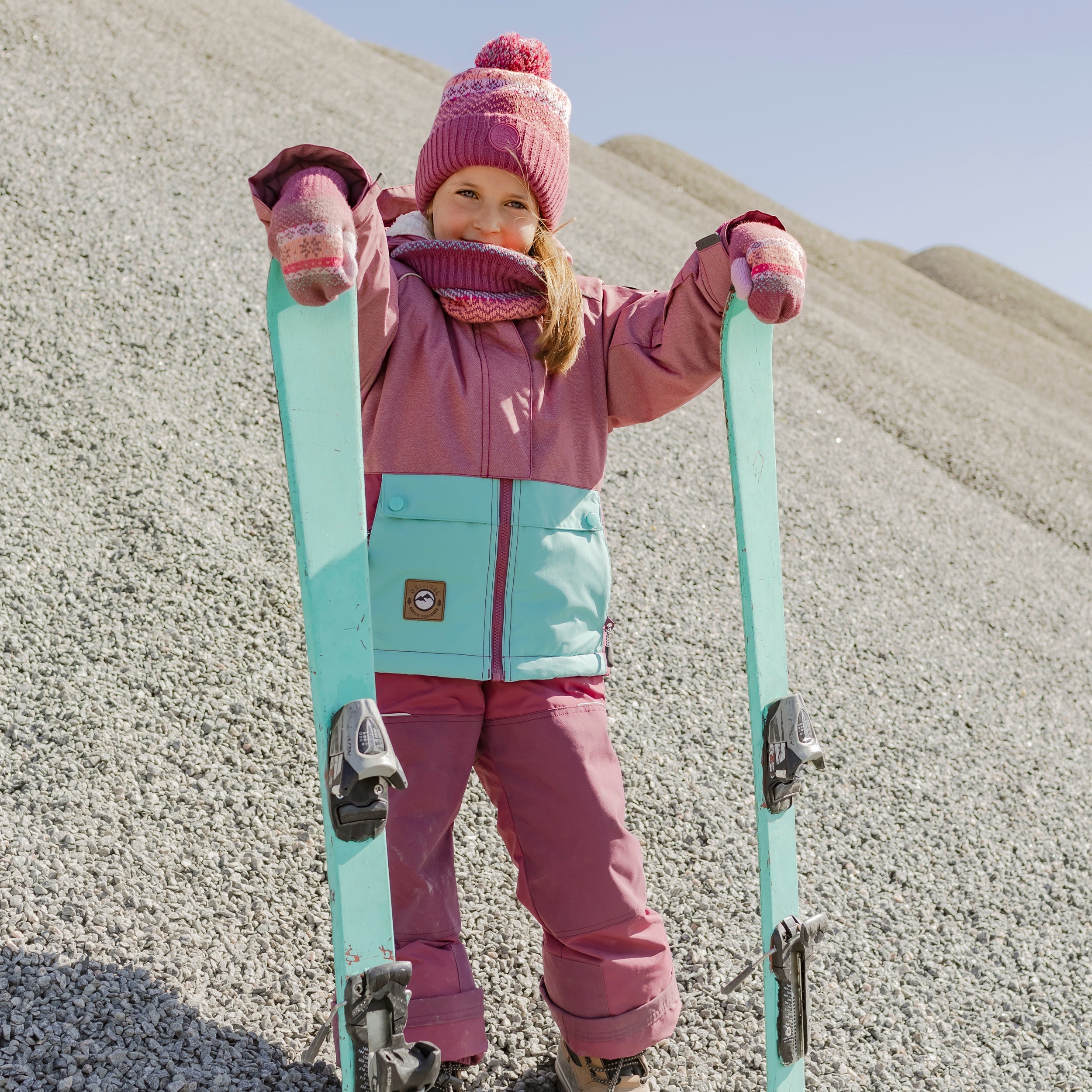 Pink, peach and turquoise knitted mittens with print, child