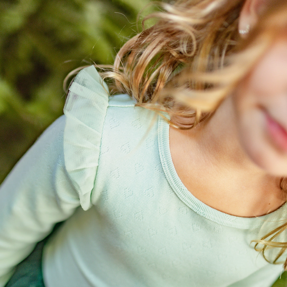 Sage green pointelle bodysuit, child