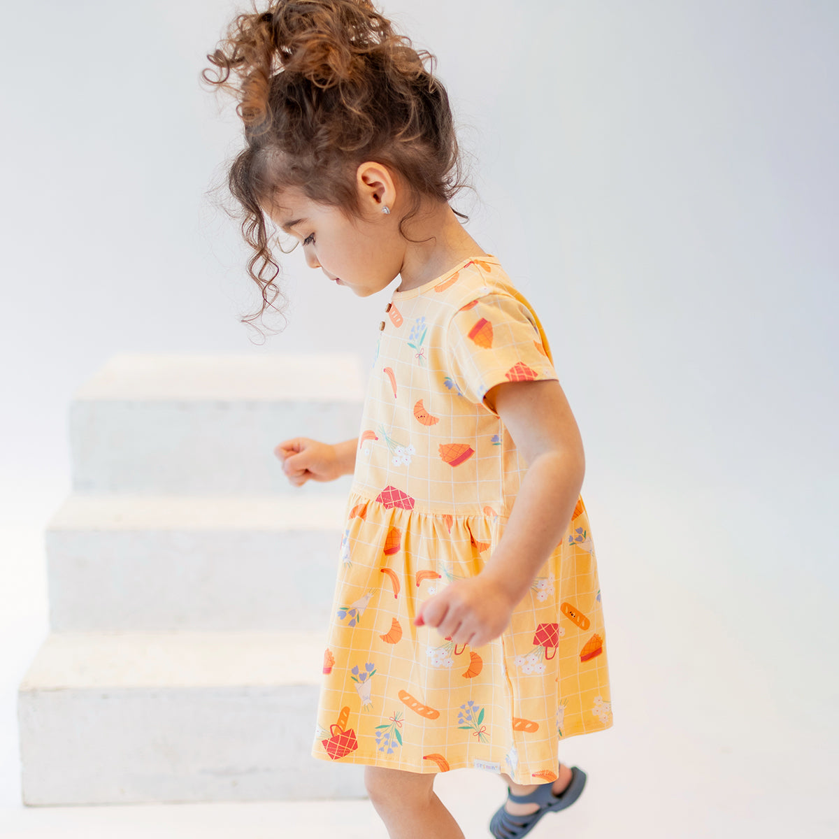 Yellow patterned dress, baby