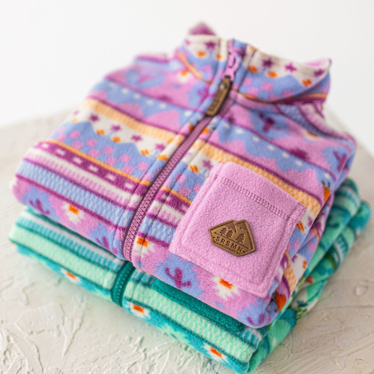 Veste en polar mauve à motifs, enfant