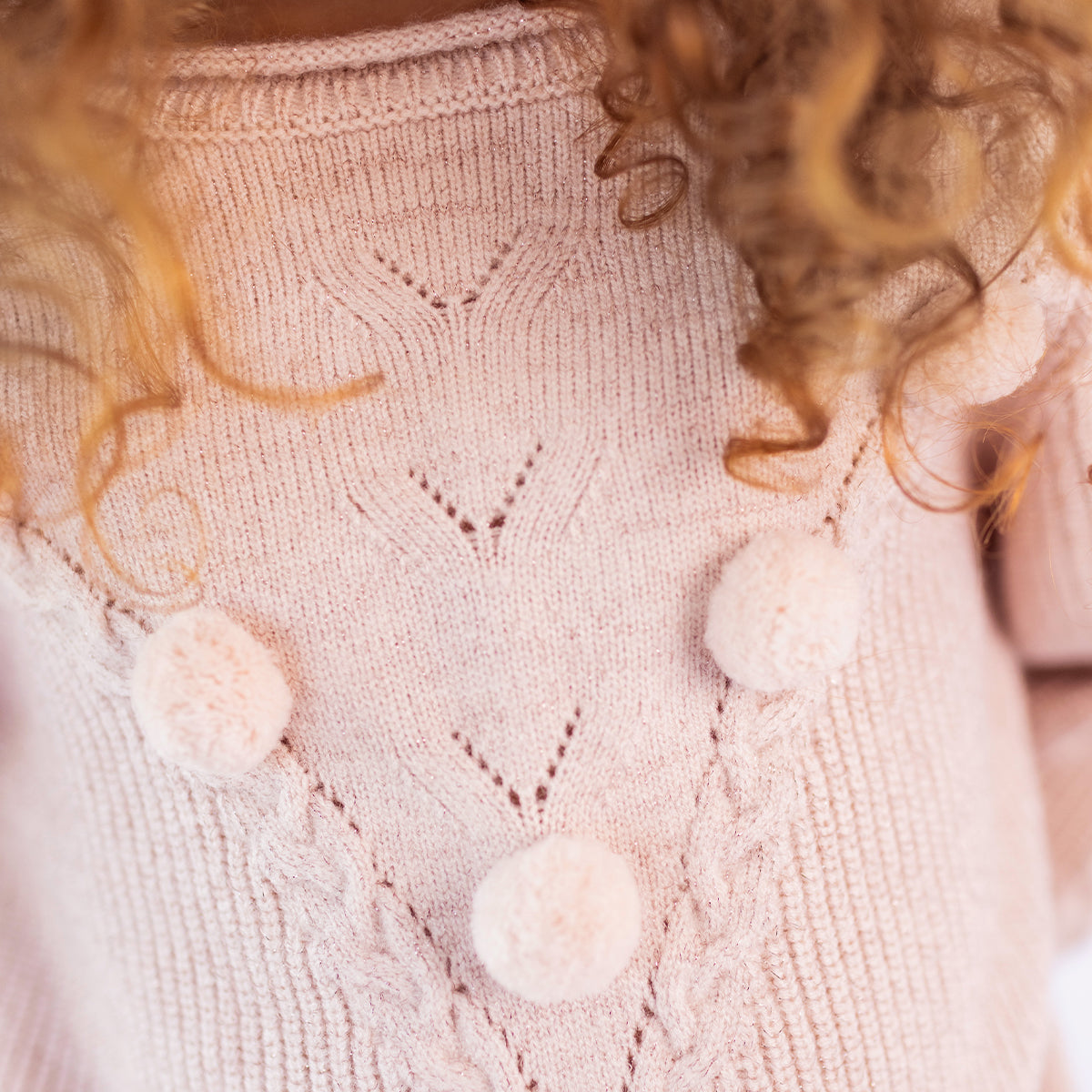 Chandail rose en tricot à pompons et torsades, enfant