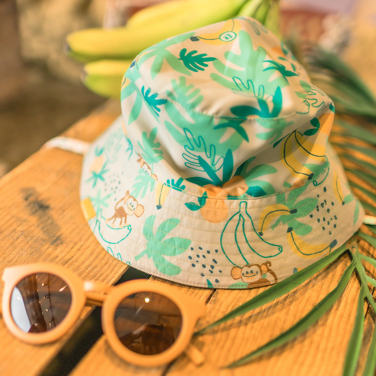Chapeau de soleil réversible beige à motifs tropicaux, bébé