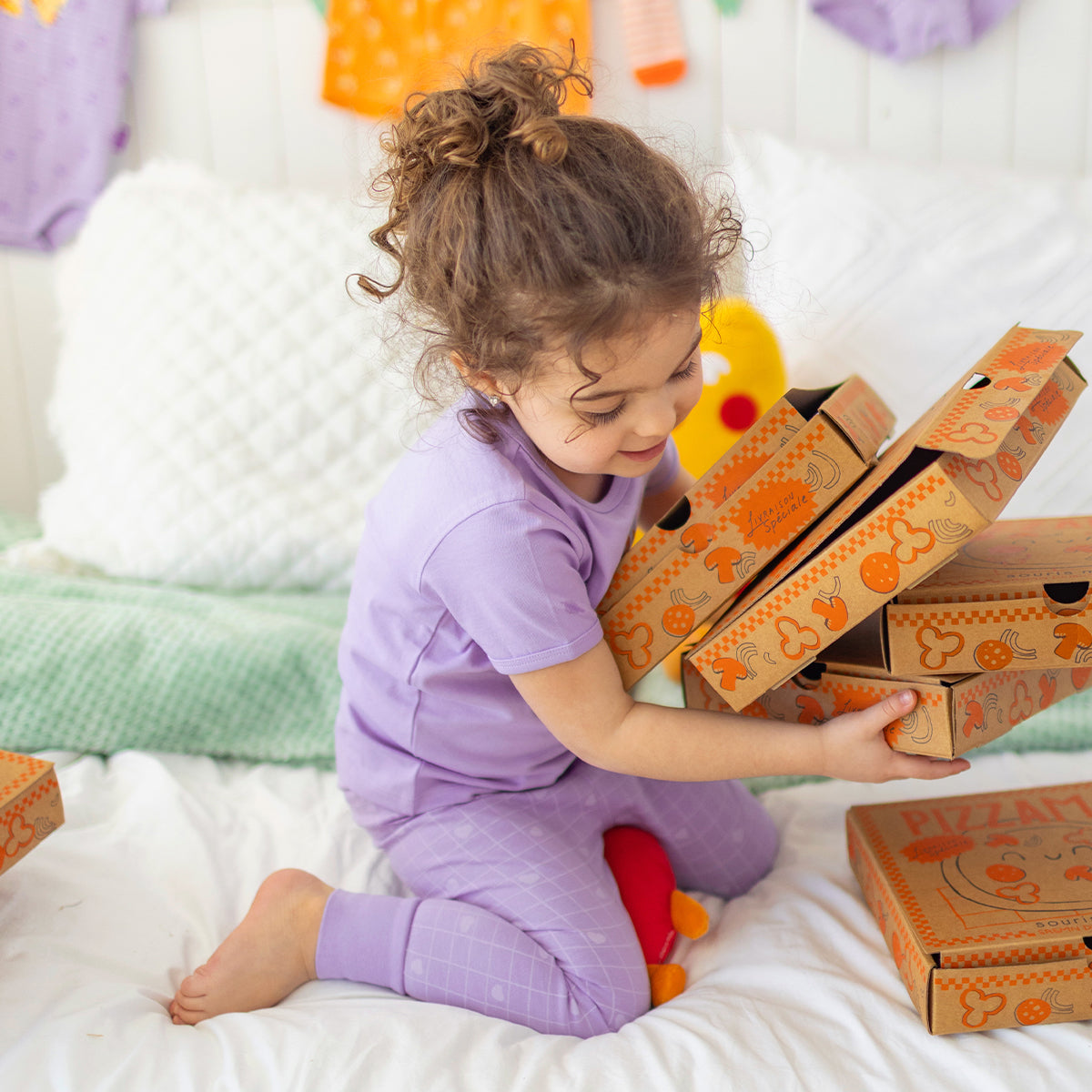 Two-piece purple pajamas with pizza patterns, baby