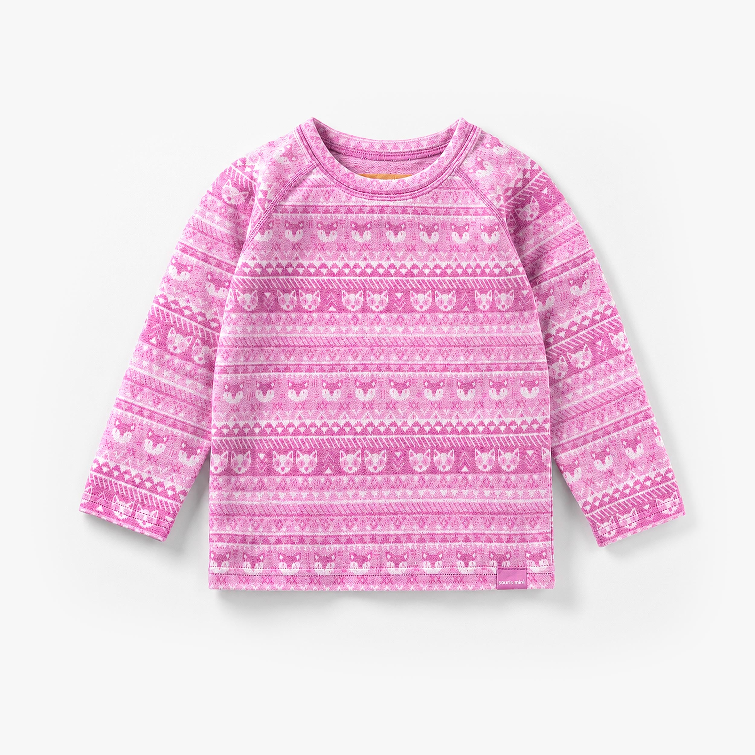Chandail rose en laine mérinos à motifs pour bébé.